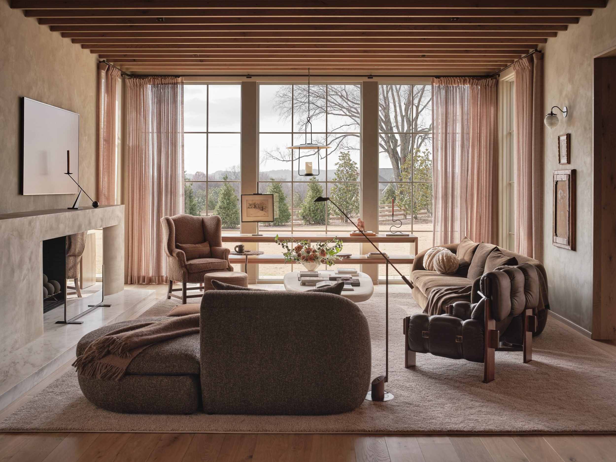 april-tomlin-interiors-compelling-restraint-living-room-fireplace.jpg