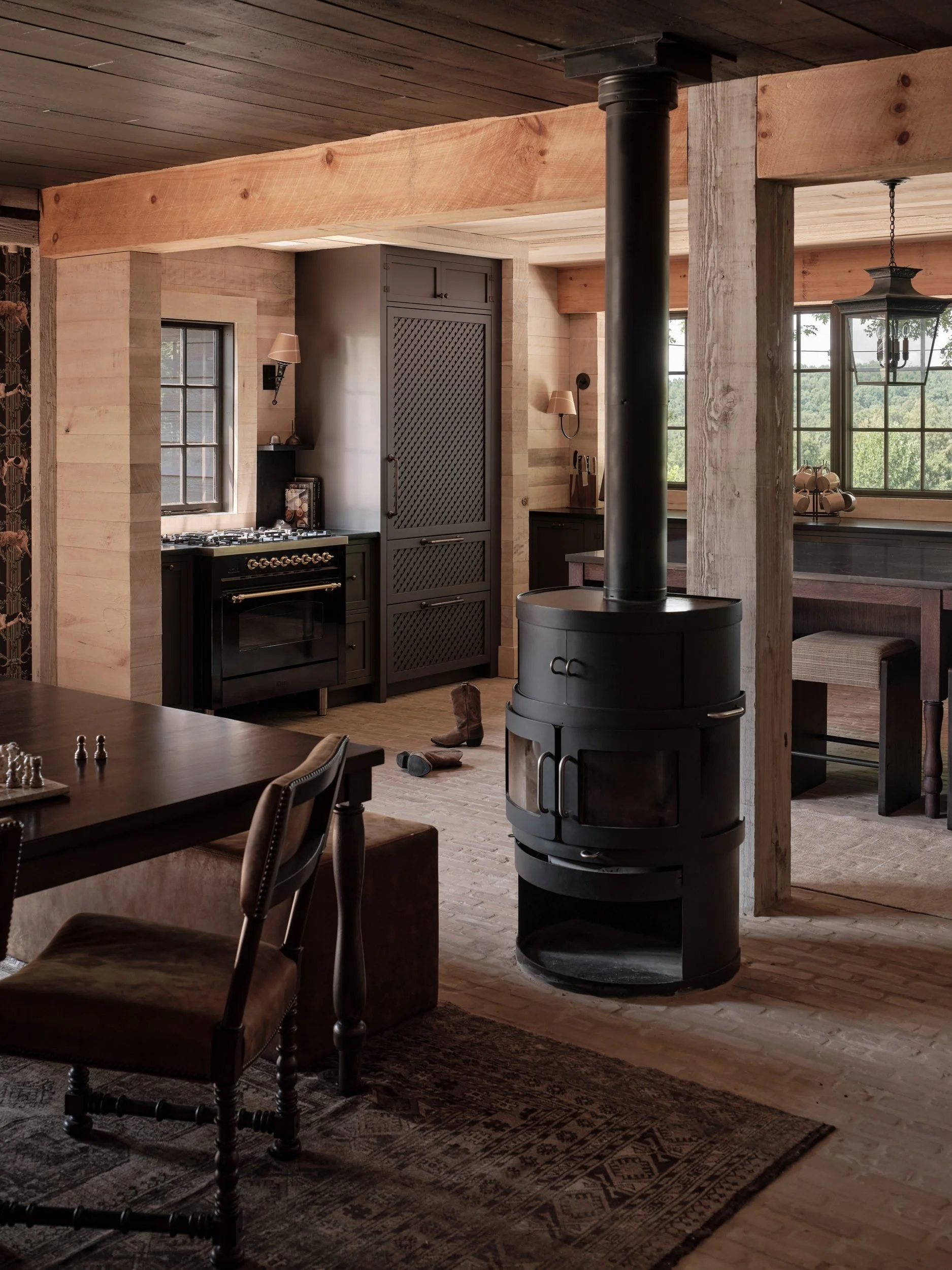 april-tomlin-interiors-the-stables-kitchen-dining-wood-stove.jpg