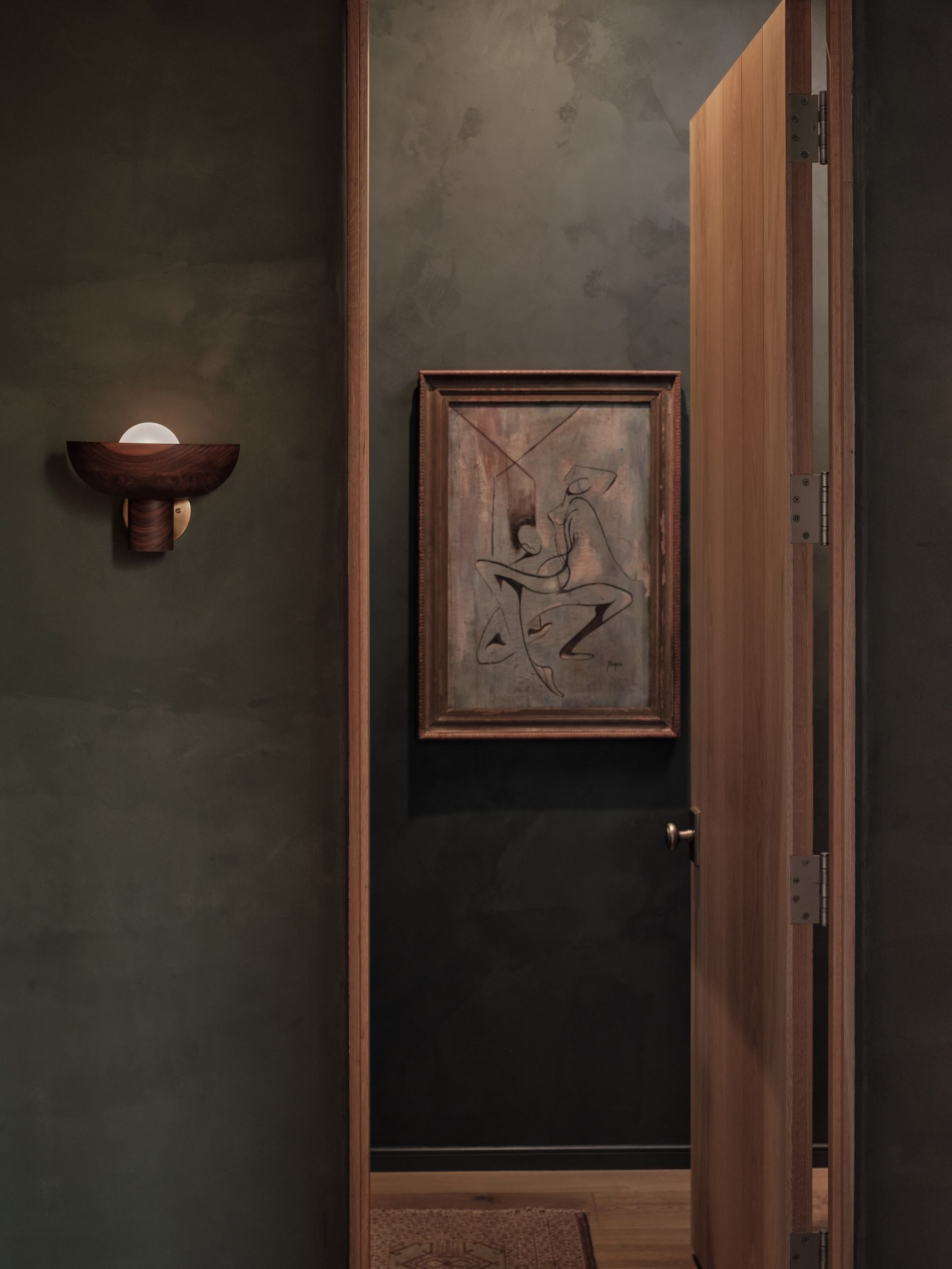 april-tomlin-interiors-compelling-restraint-powder-room-entry.jpg