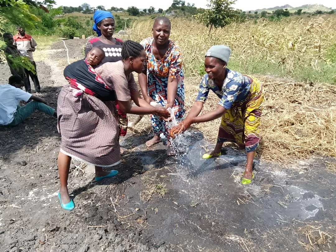 The joy of water to irrigate their crops