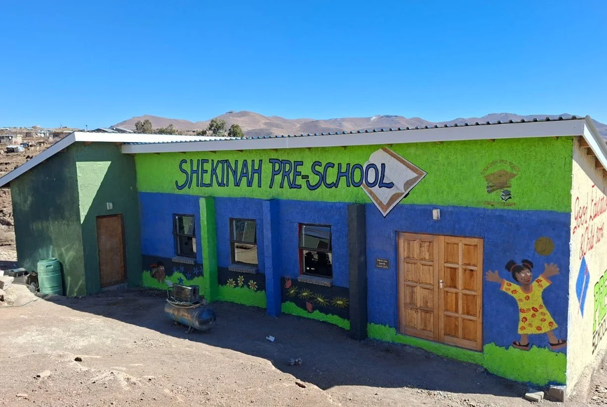 The new brightly painted preschool building