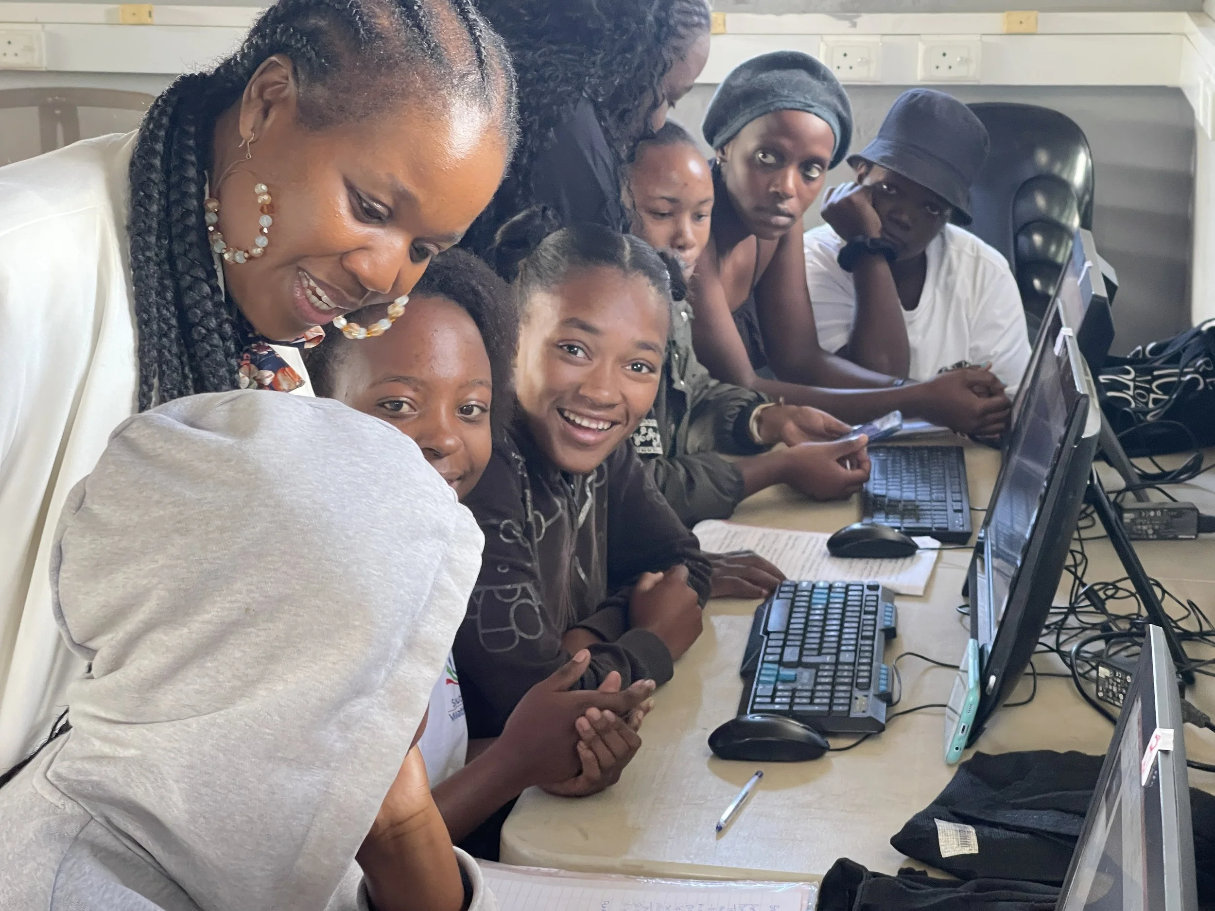 Children enjoying a computer lesson at an E3-funded computer school