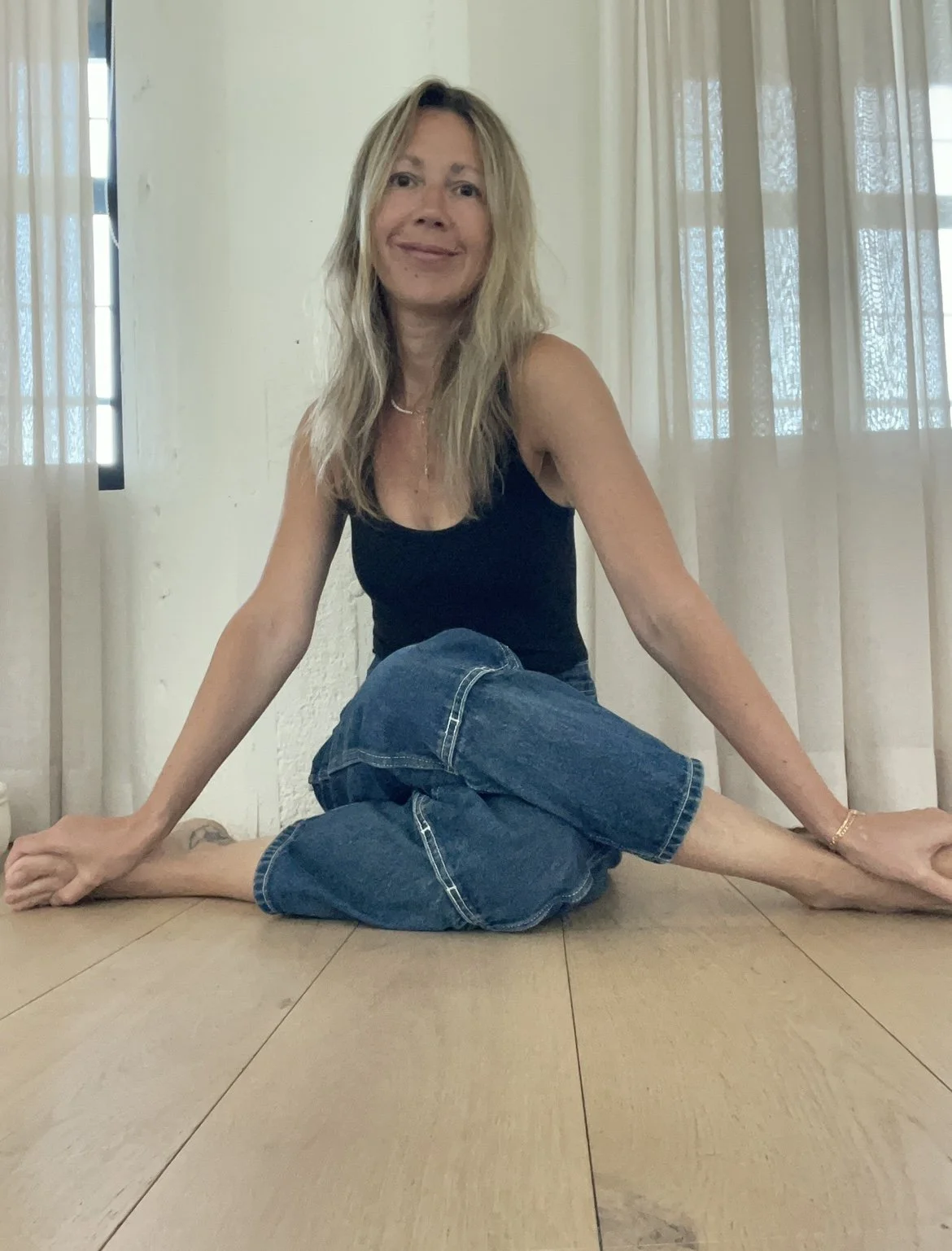 Alice seated jeans.jpg