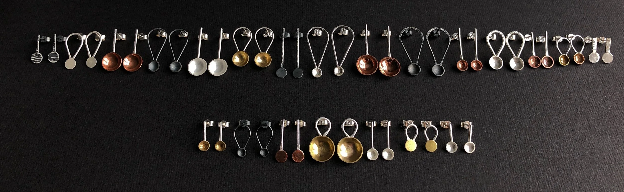 Mixed metal spoon studs