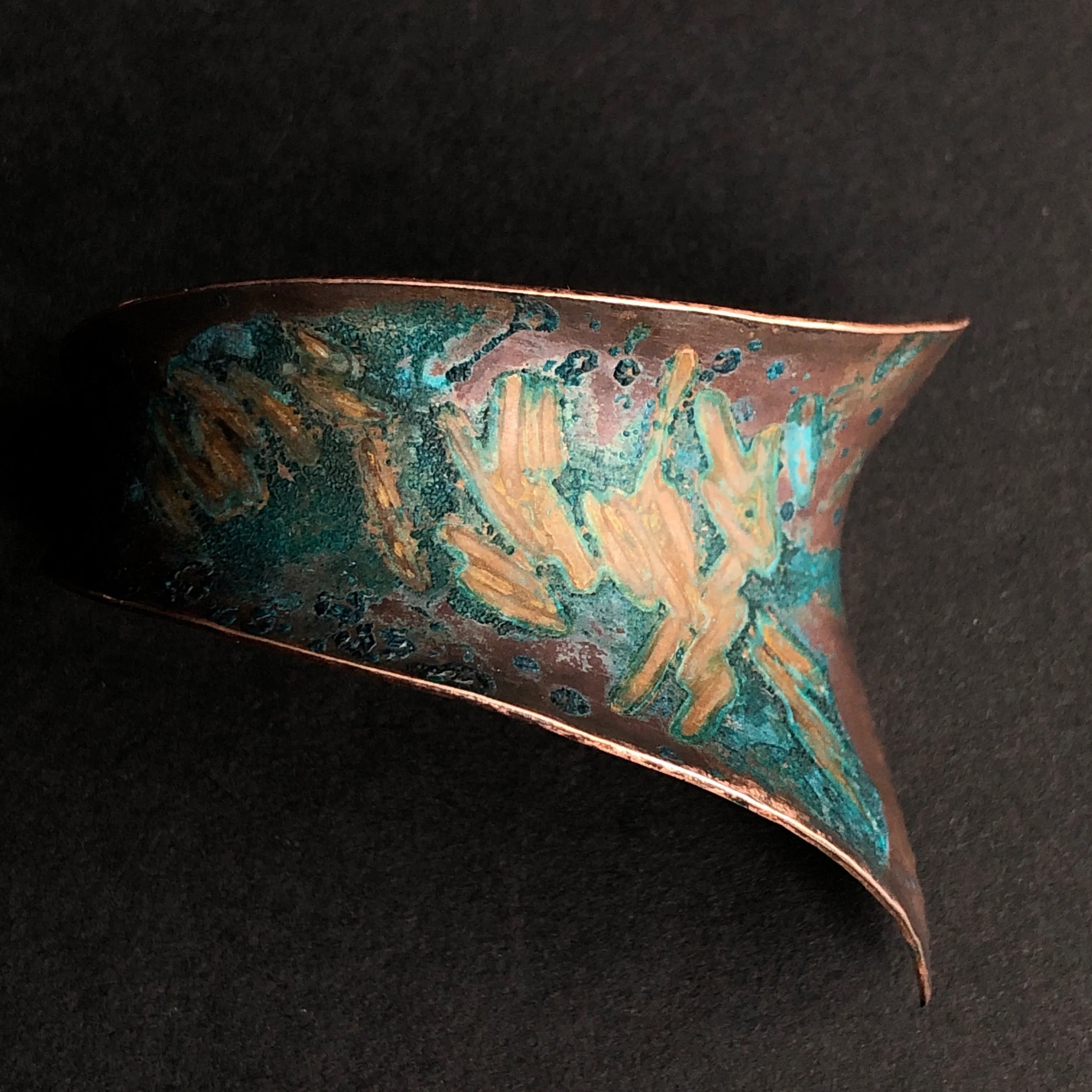 Copper brooch with rice and vinegar patina
