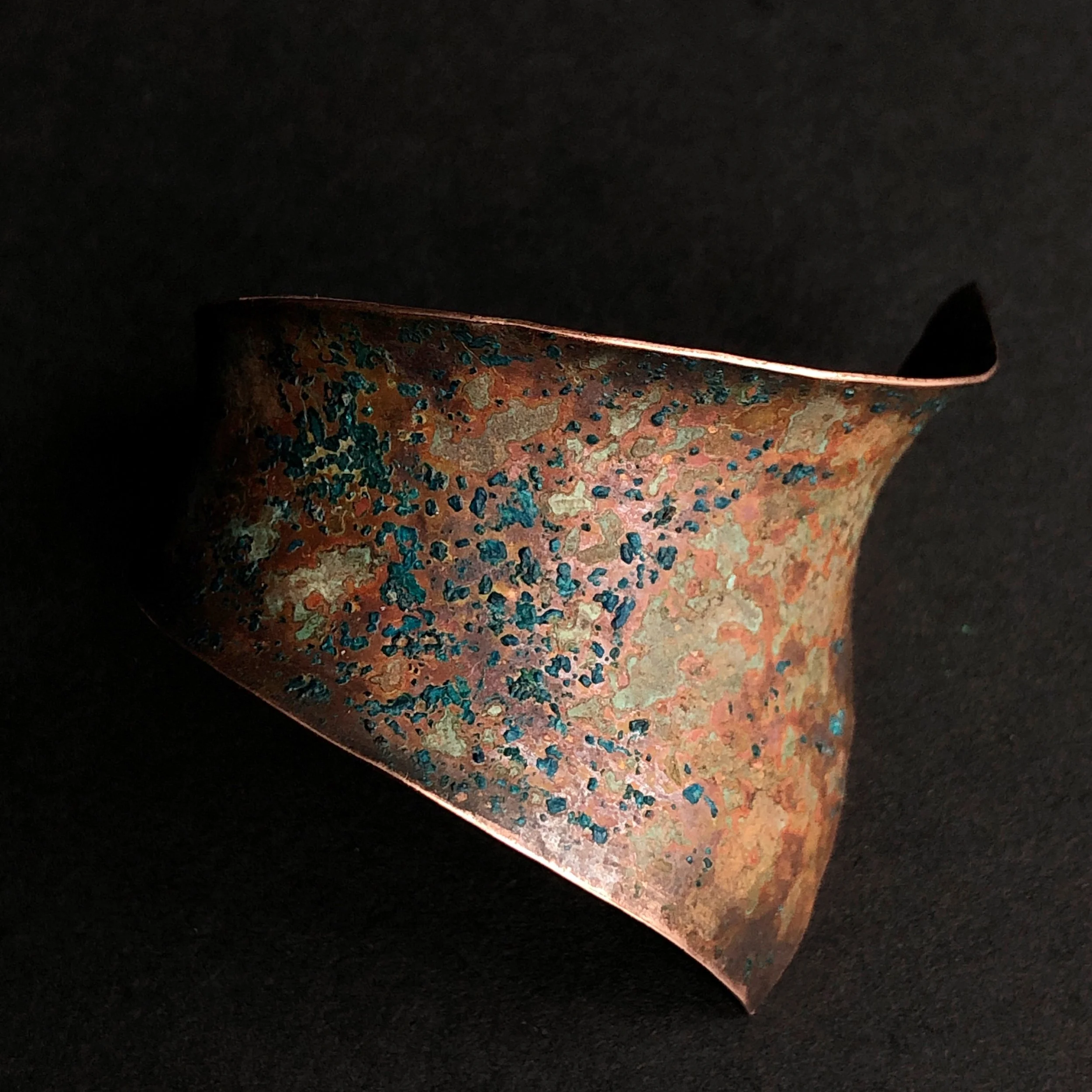 Copper brooch with sawdust and hendersons relish patina
