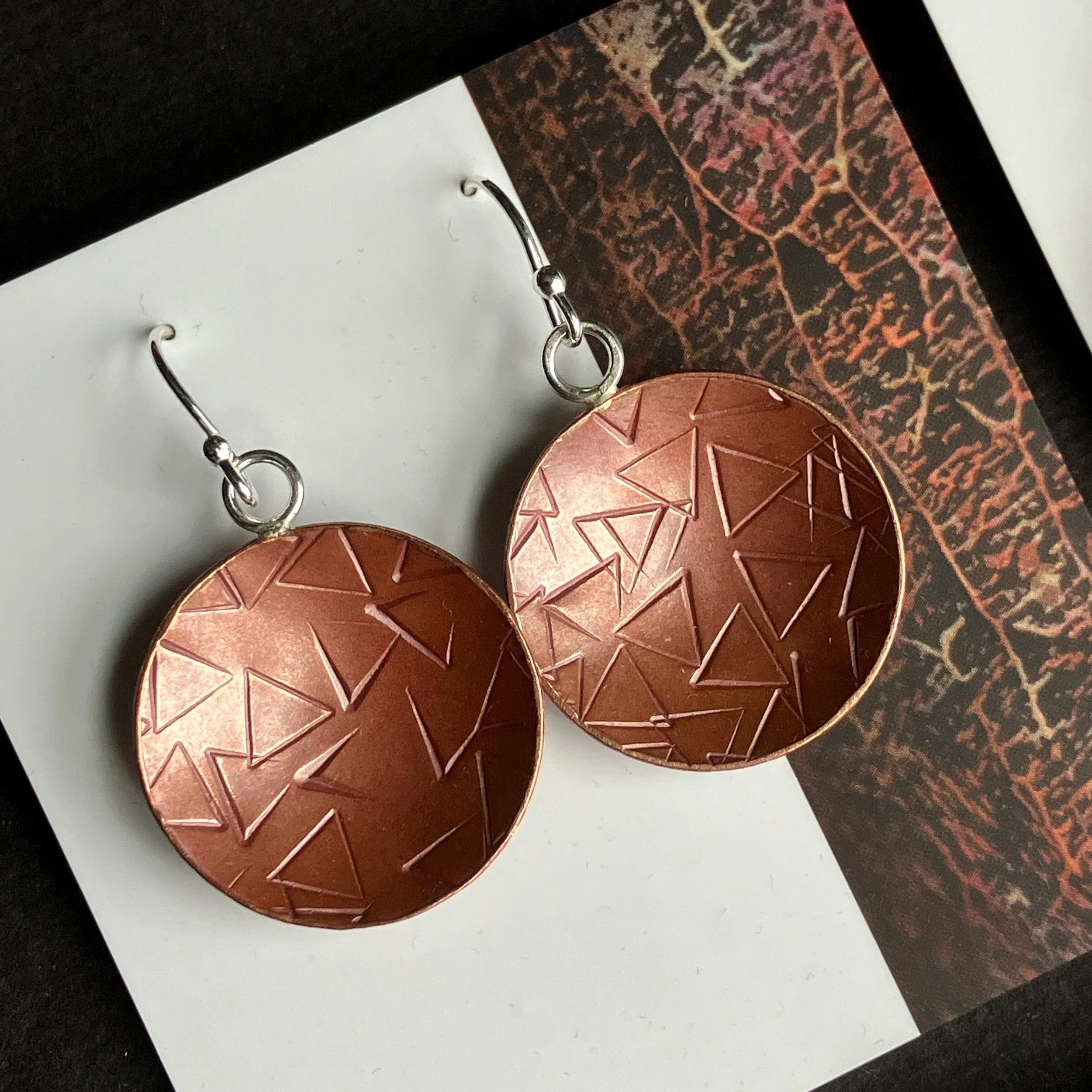 Copper bowl dangle earrings with triangle pattern
