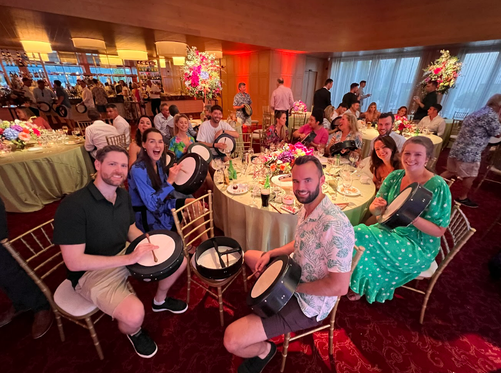 Wedidng guests enjoying a bodhran workshop