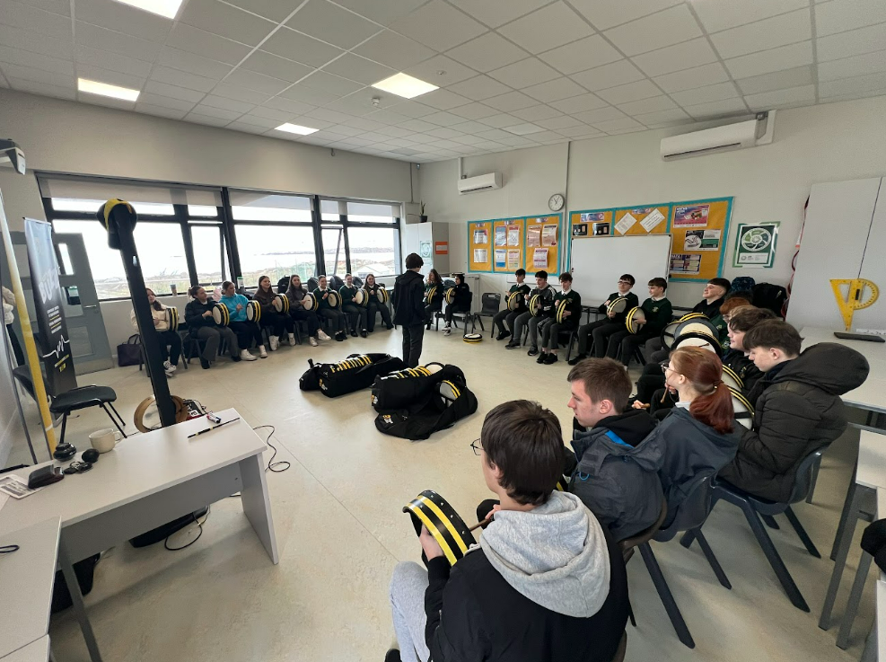 Students in a bodhran circle