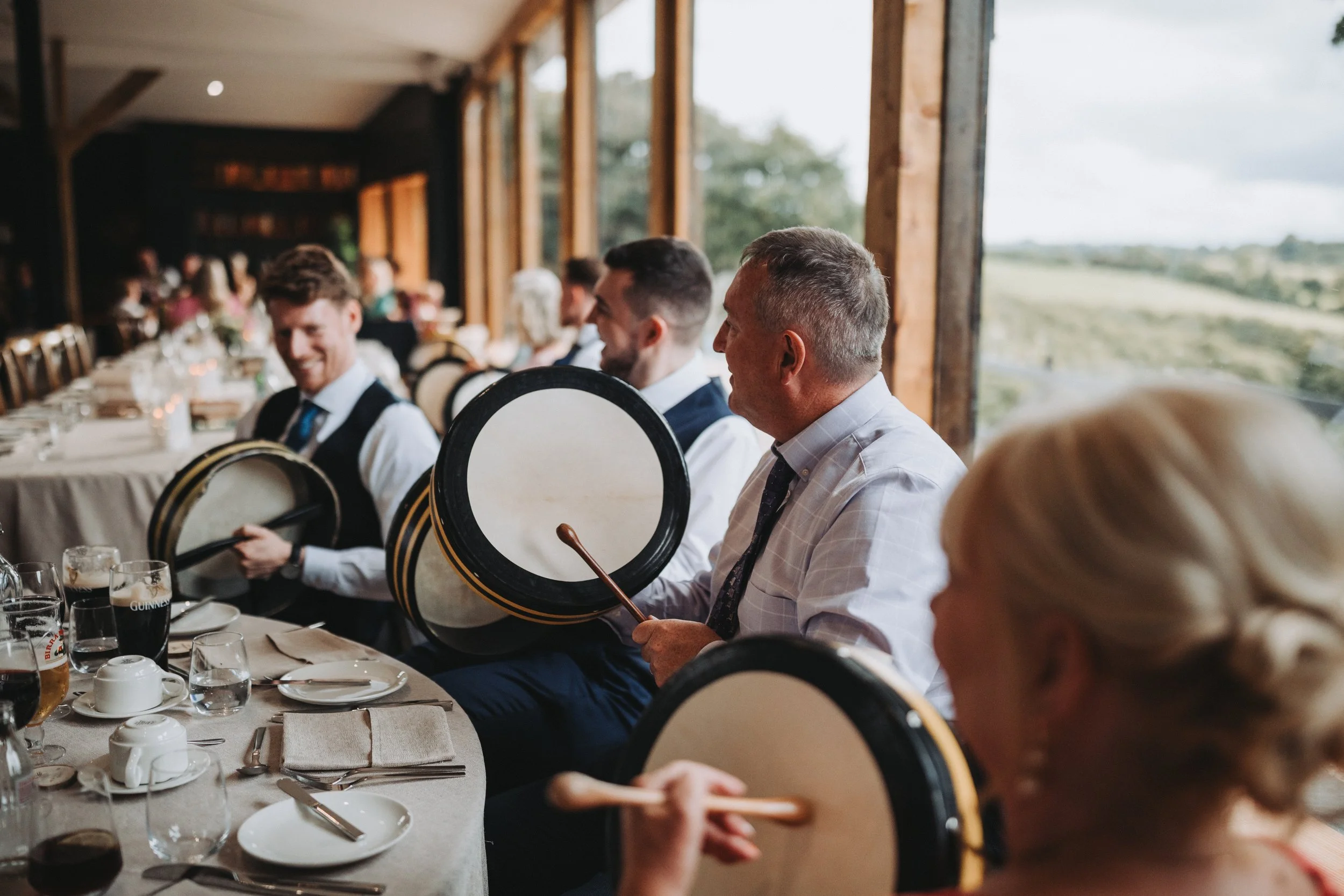 Wedding guests playing the bodhran