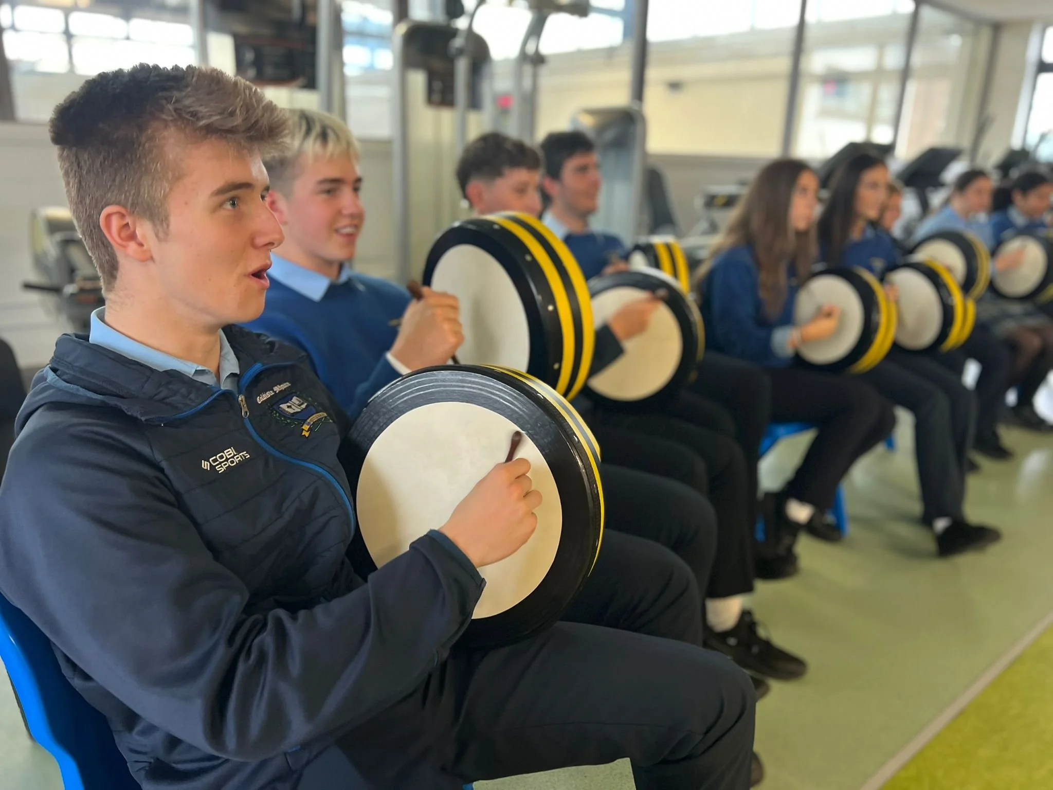 Studetns enjoying a bodhran buzz workshop