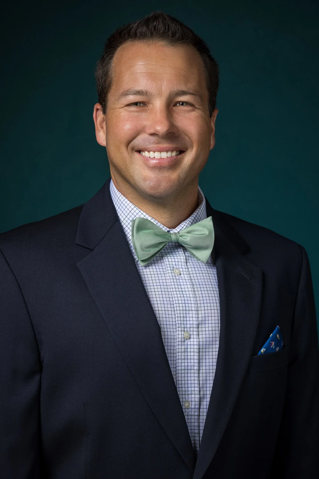Photo of Christopher Seabock wearing a bowtie with a full head of hair.