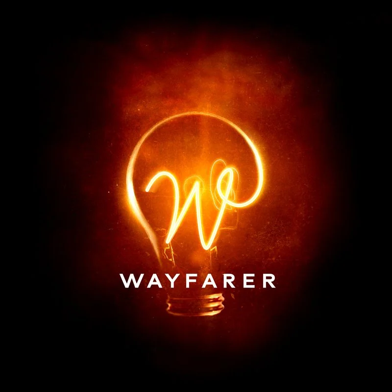A glowing light bulb with a neon-style wire forming the letter 'W' inside it, and the word 'WAYFARER' written below.