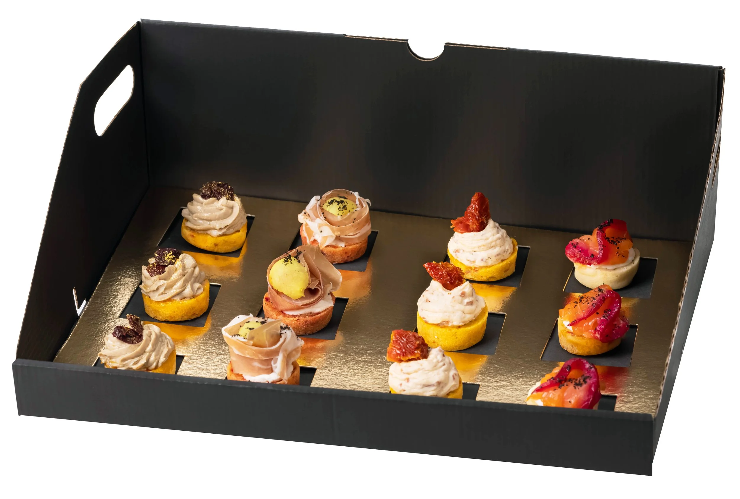 Tray of assorted gourmet mini canapés with various toppings.