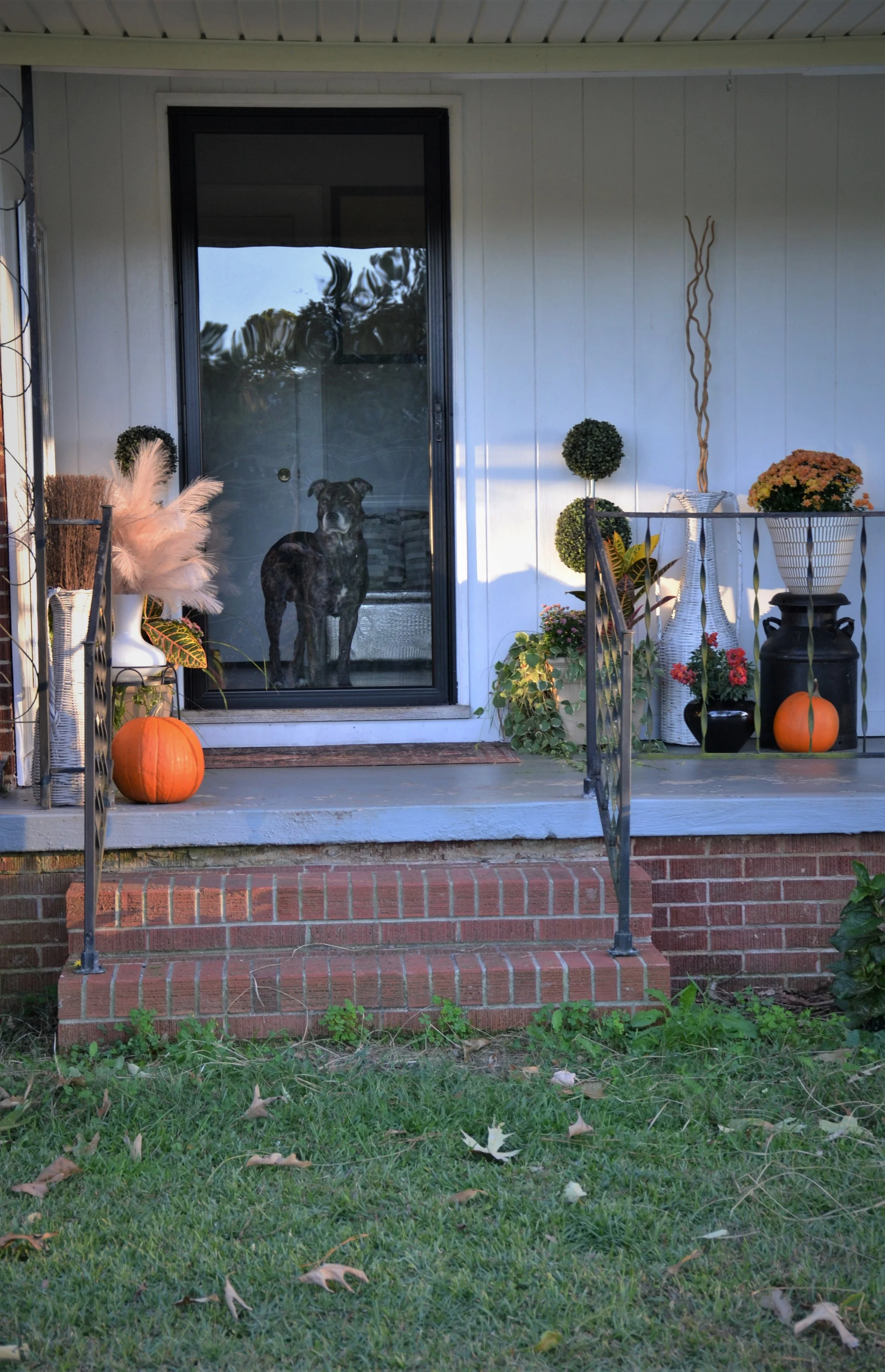 front porch fall decorating ideas with pumpkins and mums