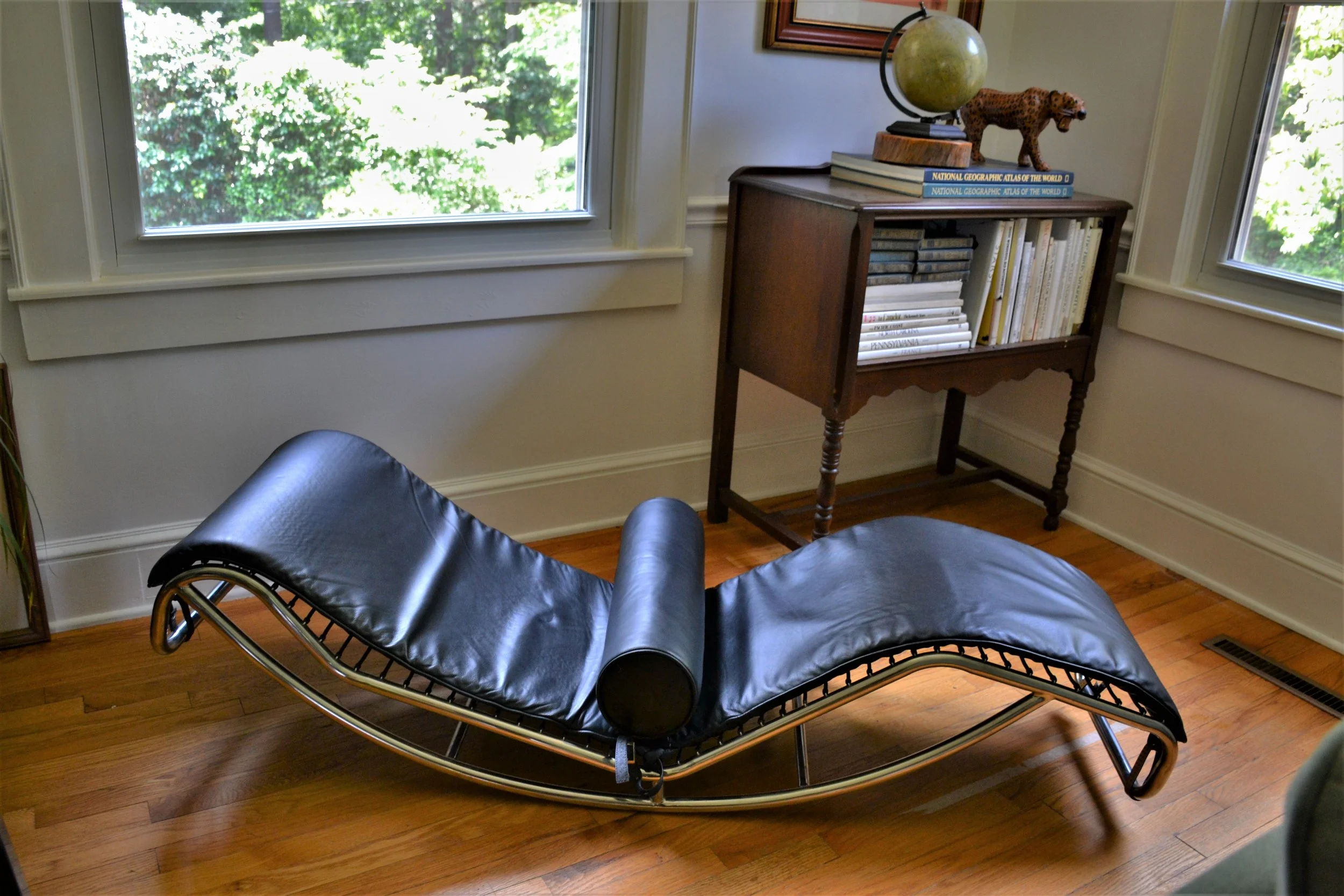 vintage mid century modern chaise lounge black leather Italian style found at thrift store
