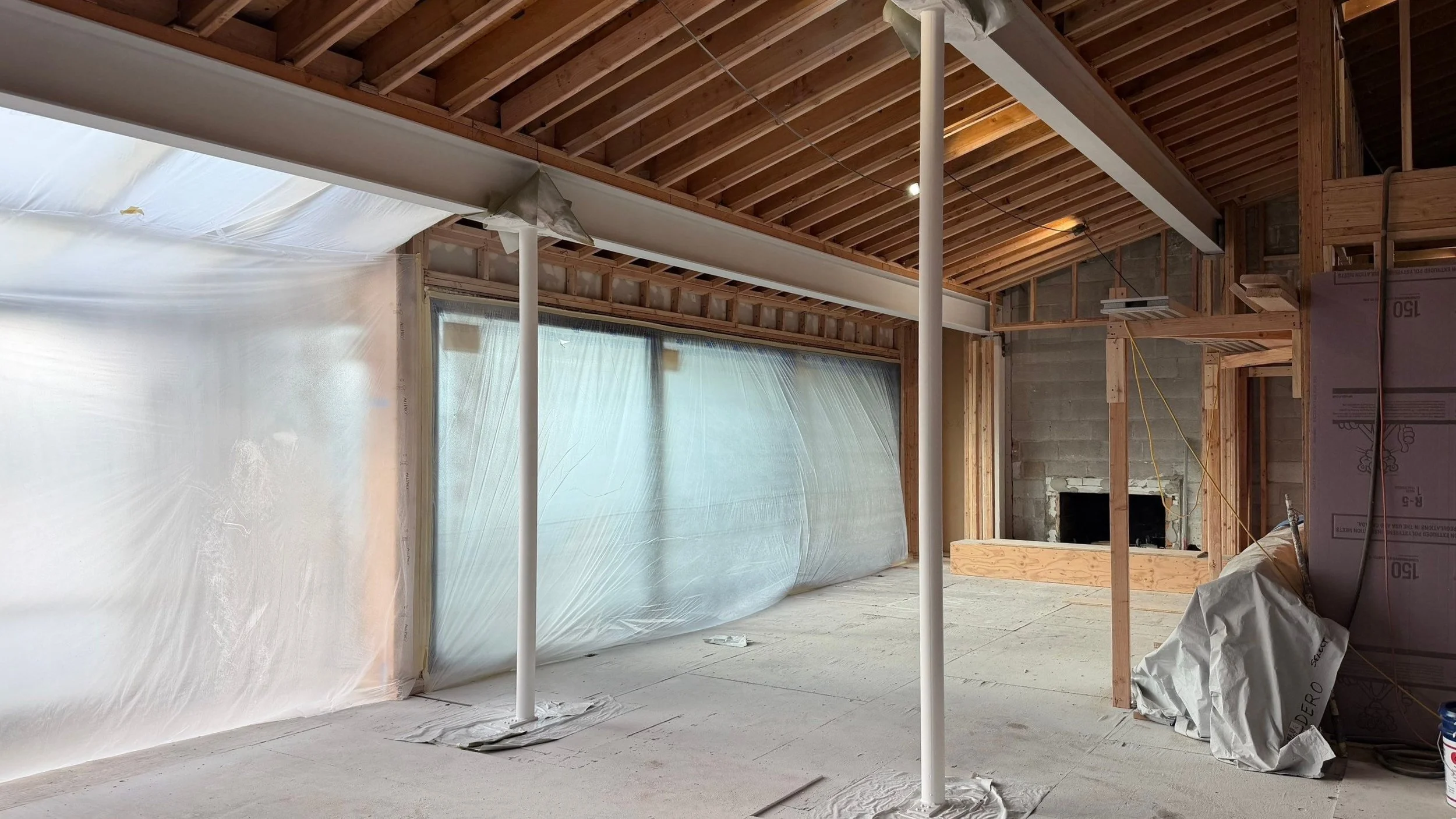 Intumescent Painting in Seattle - Coating steel beam with intumescent in Commercial interior