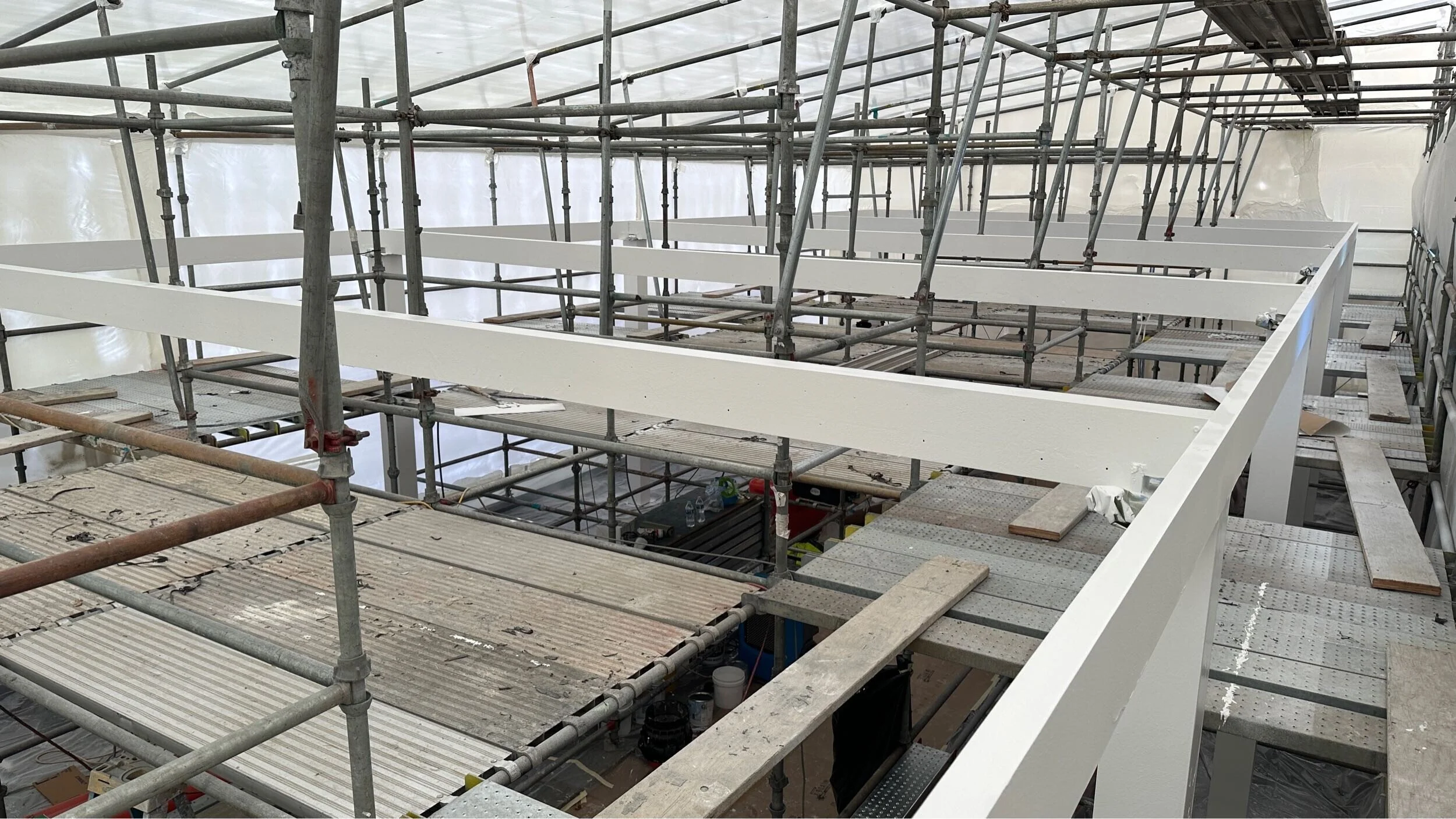 Intumescent Painting in Seattle - Coating aluminum canopy with intumescent in Commercial exterior