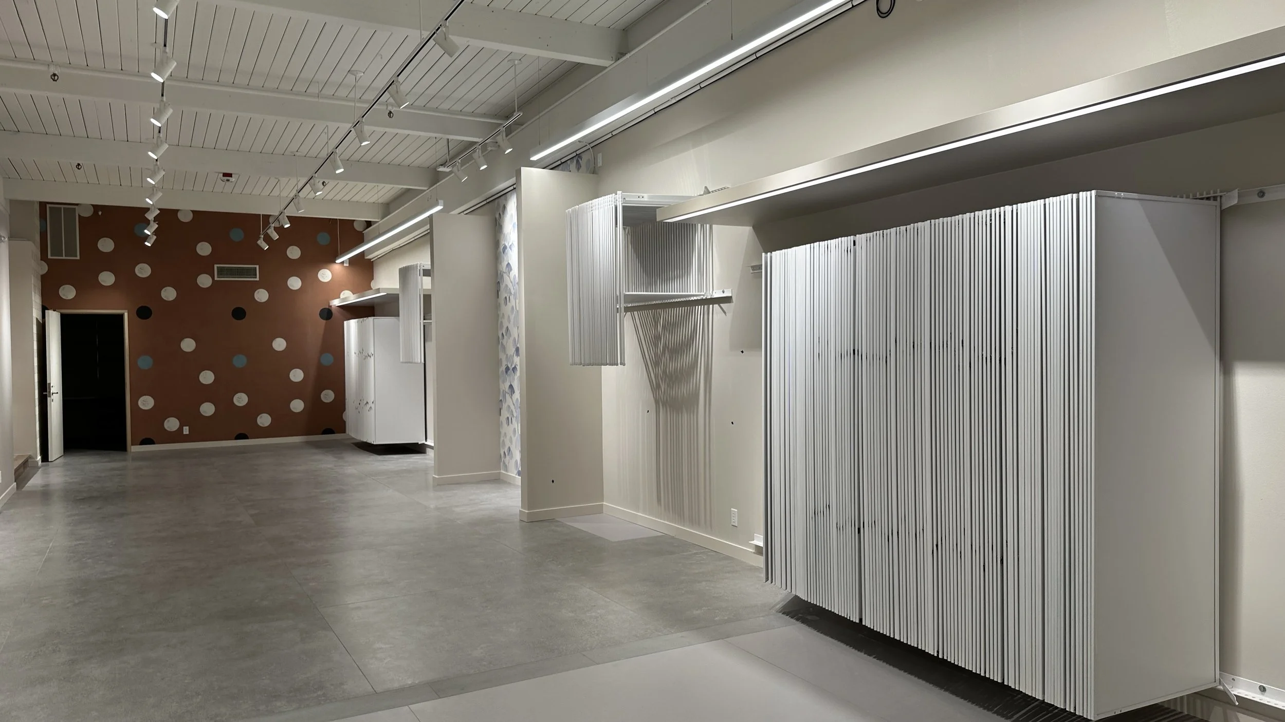 Finished commercial showroom interior after painting at Schumacher TI in Georgetown, Seattle