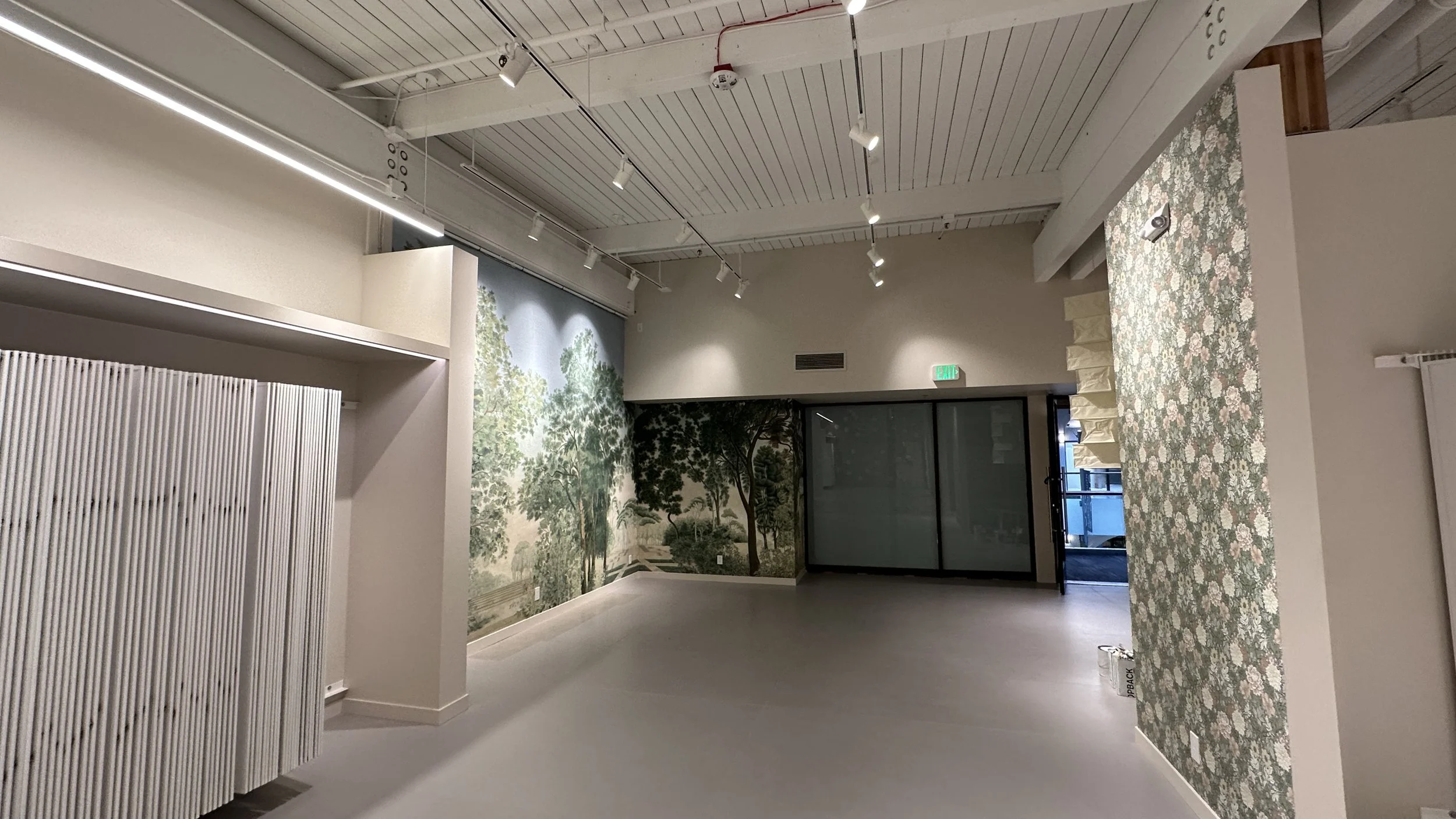 Completed retail showroom interior at the Schumacher tenant improvement in Seattle
