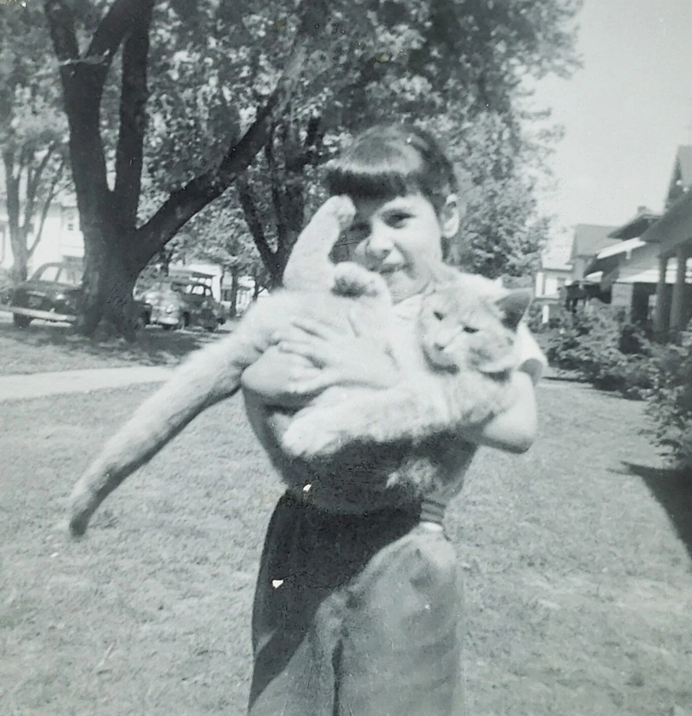 Young Lynne Sturtevant and cat.jpg