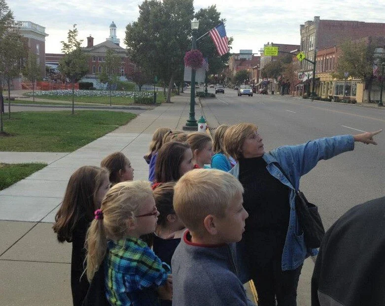 Lynne Sturtevant with kids tour group