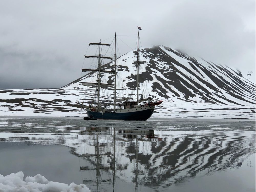 The Antigua anchored in Mushamna bay. Arctic Circle Residency, June, 2018.