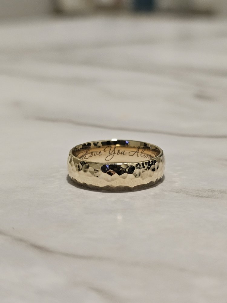 Delicate custom wedding band by A. D'Mae Diamonds