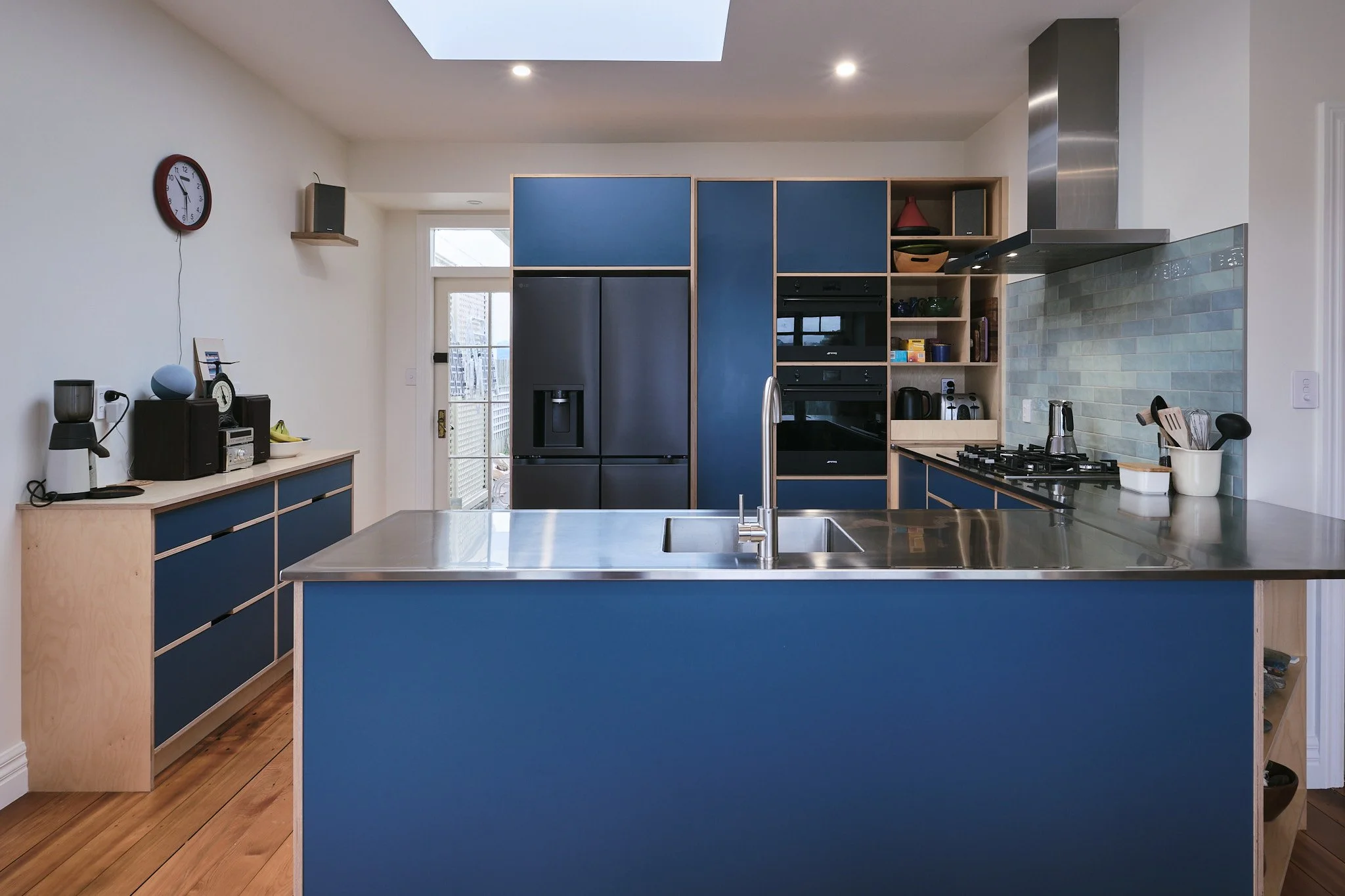 Blue plywood kitchen