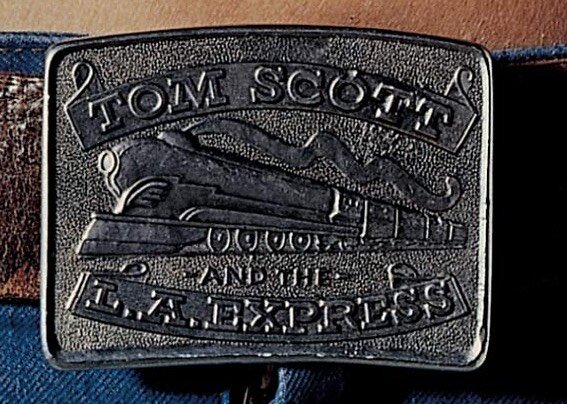 I am trying to find this vintage belt buckle from my L.A. Express days. I thought I found one but that did not pan out. Long story! If anyone has one or knows where one might be, I would greatly appreciate that information. DM me here OR send me note
