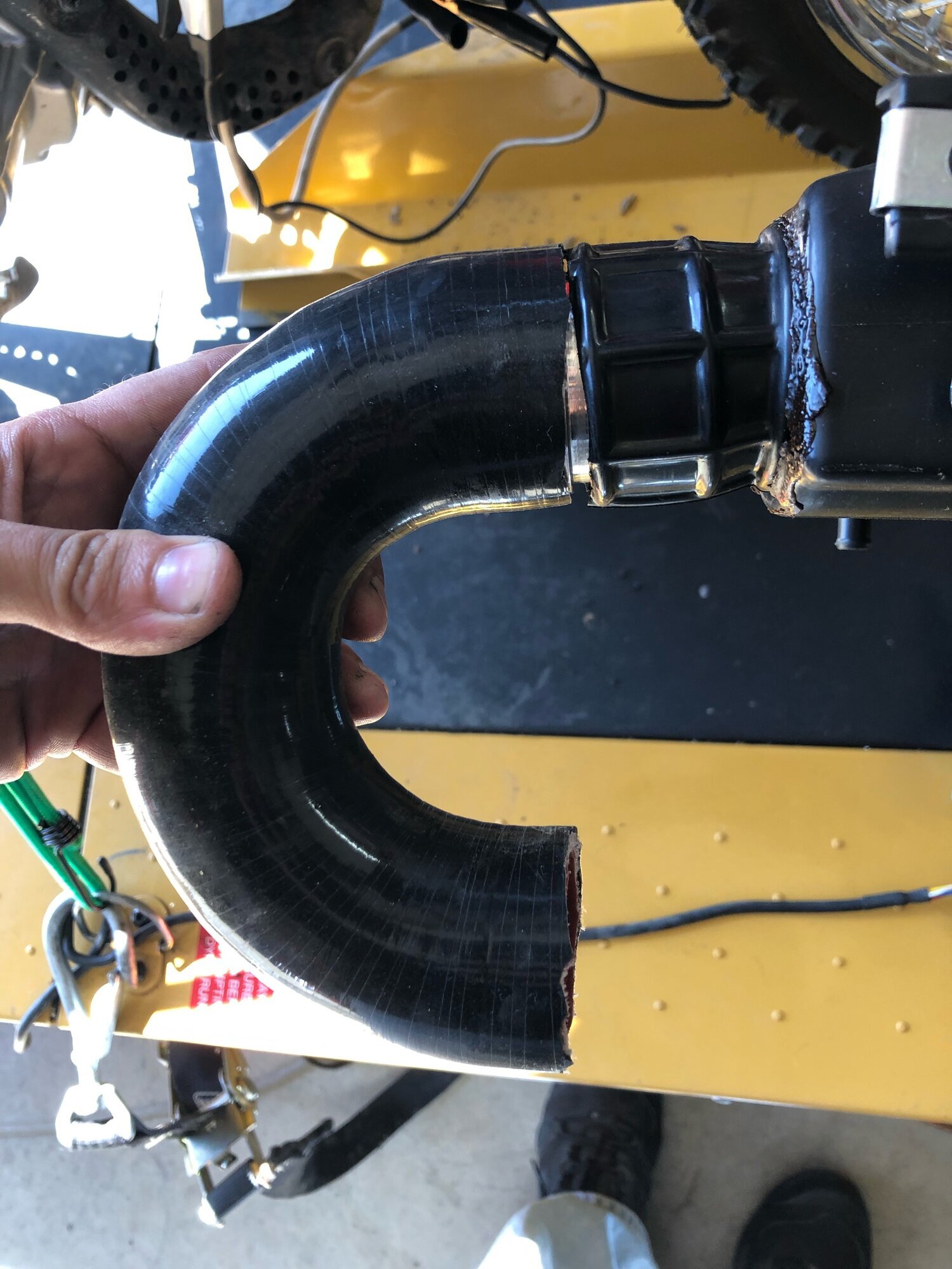 With the smaller exit for the intake tube, we found it to be a large restriction for the stock airbox. We cut and replaced the hose with a 1.5” ID 180* bend HPS silicone hose and 1.5” aluminum adapter shown in the photo above. This generally runs a…