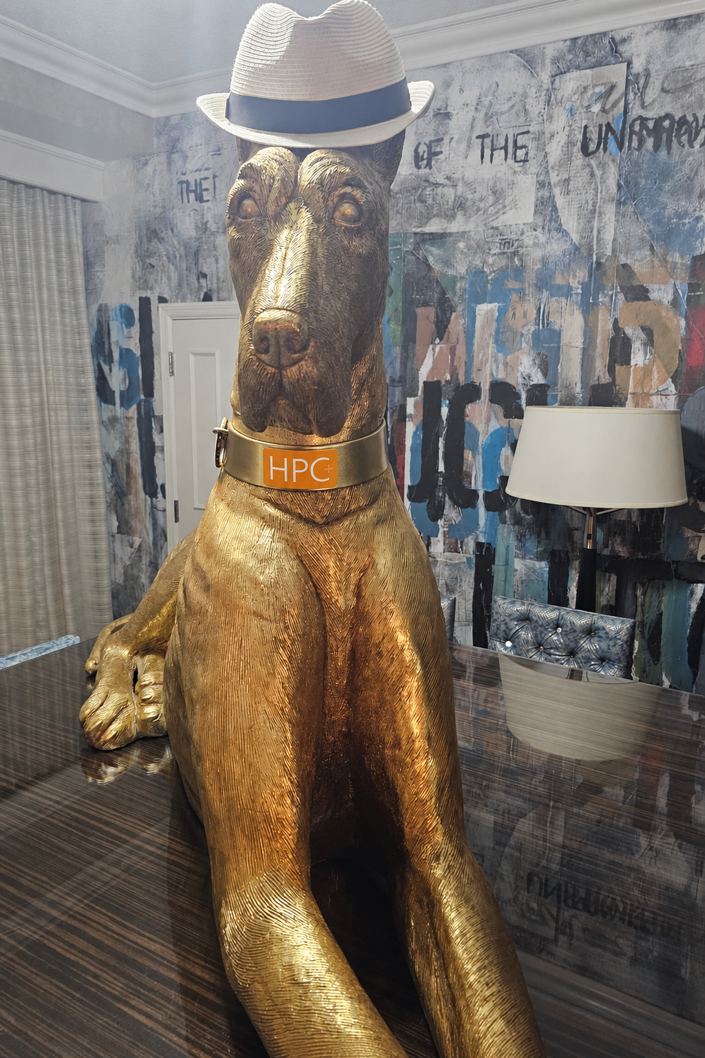 DOG STATUE WITH HPC COLLAR.png