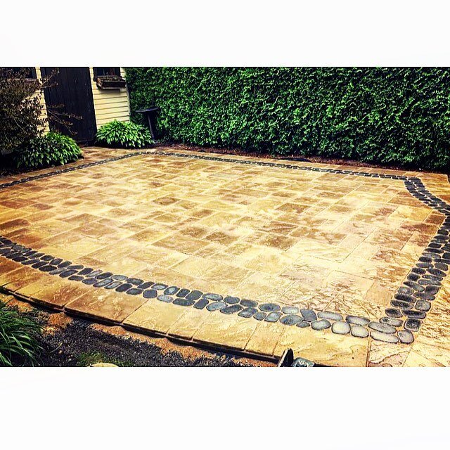 Two days in and out! Blue 60 chestnut brown pavers with an onyx black antika inlay #outdoorspace #patio #techobloc #stone #hardscape #landscape #montreal #summer #design