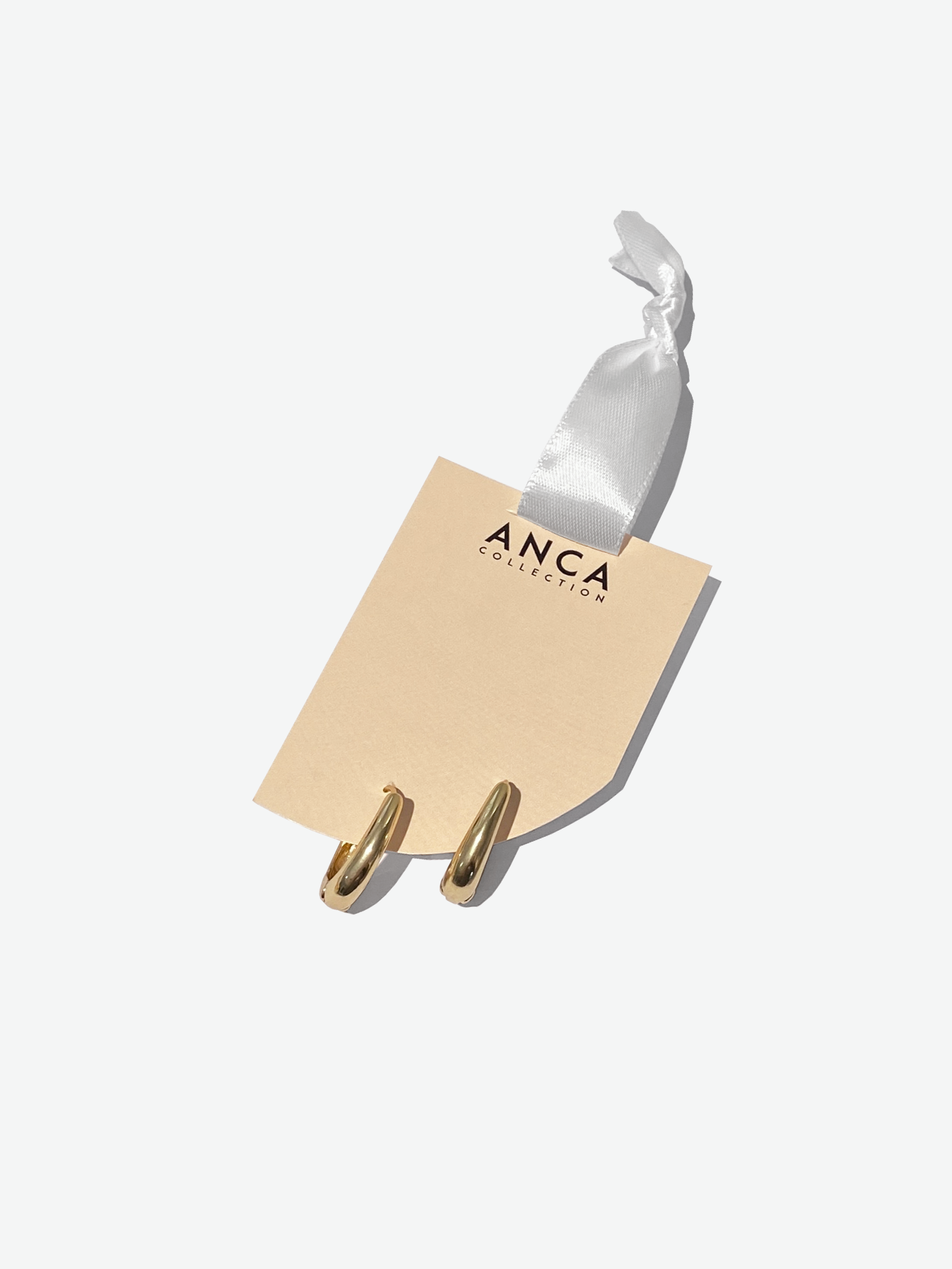 Gold Oval Loop Earrings 3.png