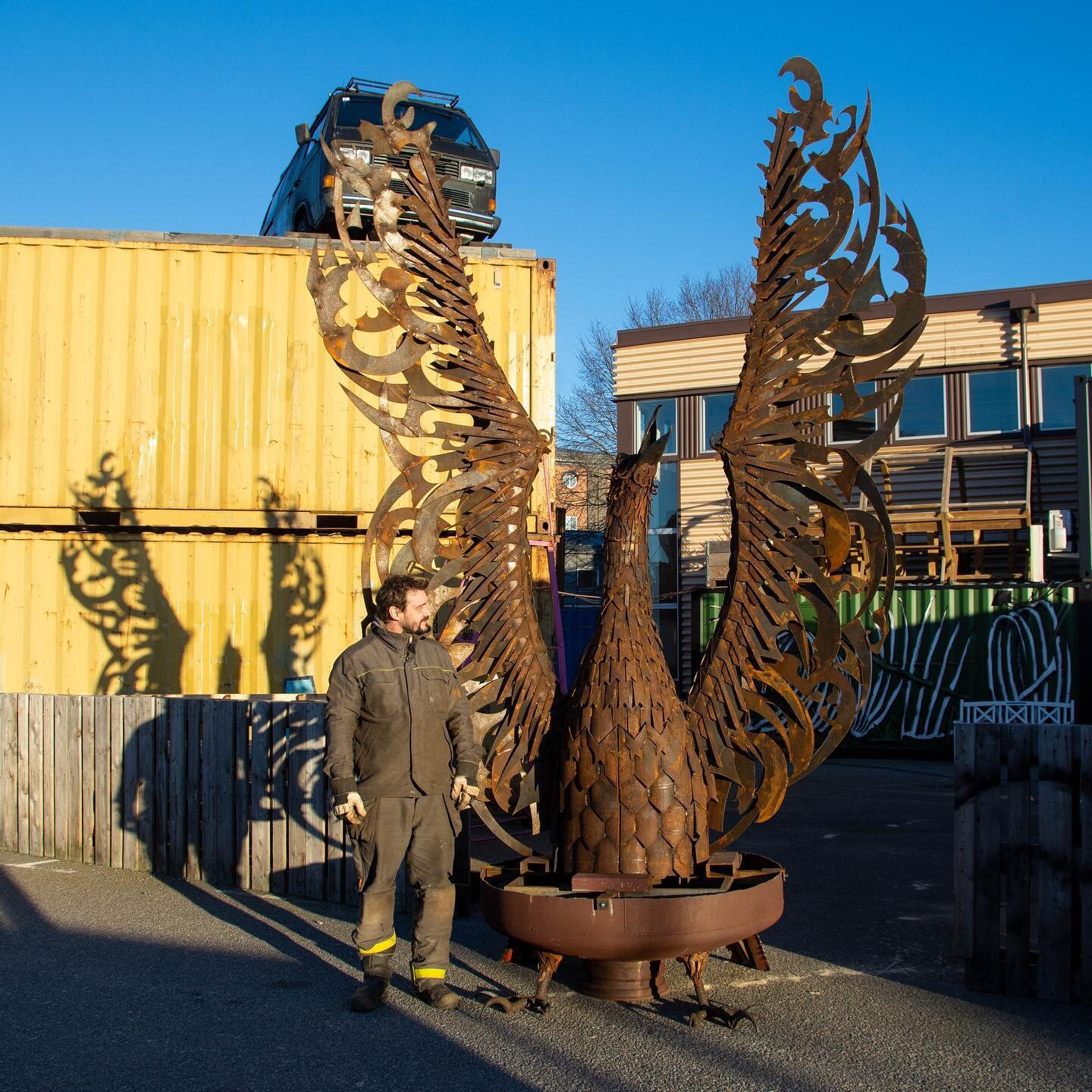 Introducing #Frihamnstorget &lsquo;s Phoenix - constructed from entirely cutoffs of previous projects. The belly opens to house a flame thrower (naturally). Come by and check it out! 
.
.
.
#welding #art #publicart #phoenix #frihamnstorget #blivande 
