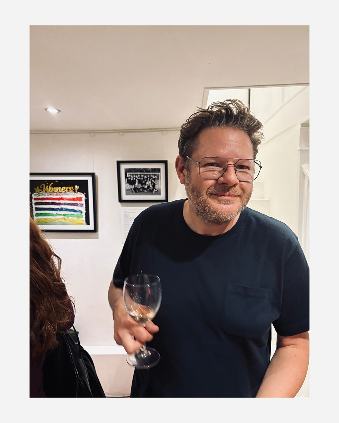 Crowd at a private view at a photography exhibition