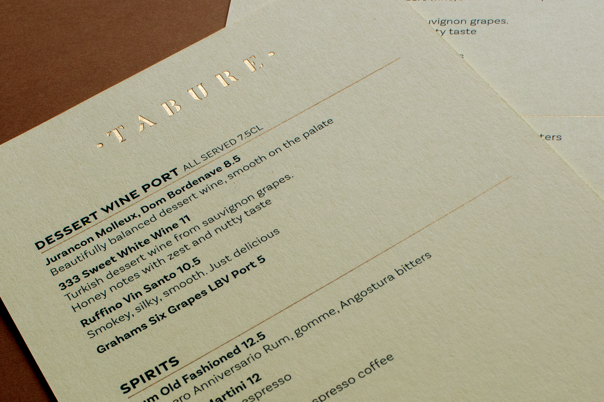 Tabure restaurant menu design by Good Noise branding agency.