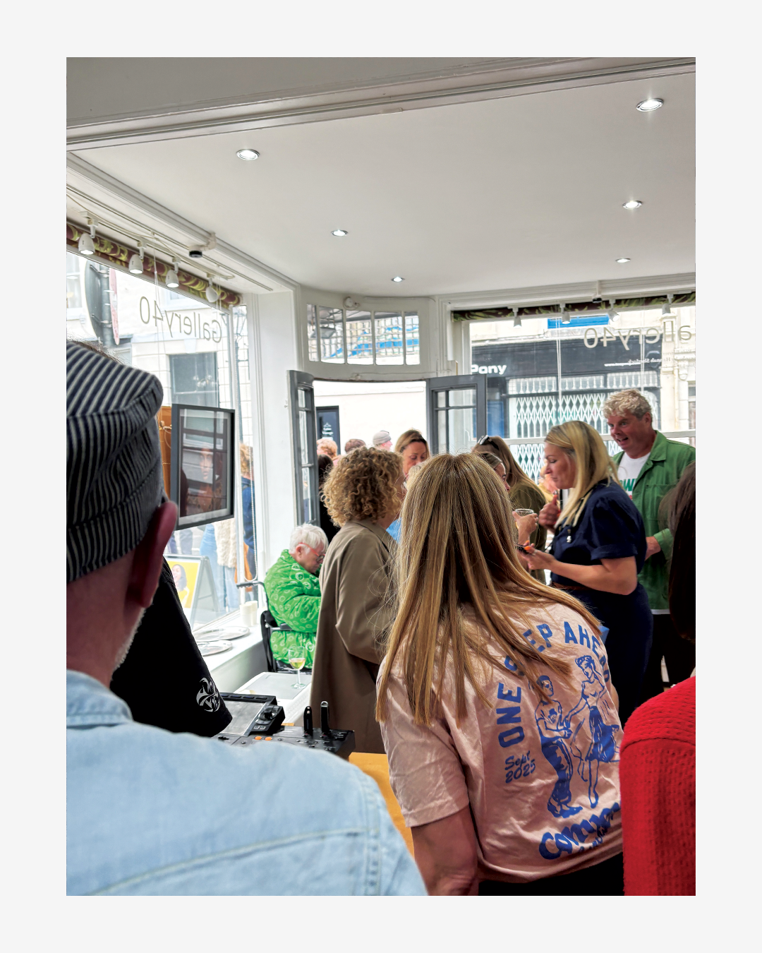 Crowd at a private view at a photography exhibition