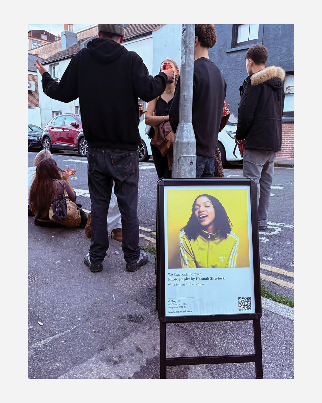 Crowd at a private view at a photography exhibition