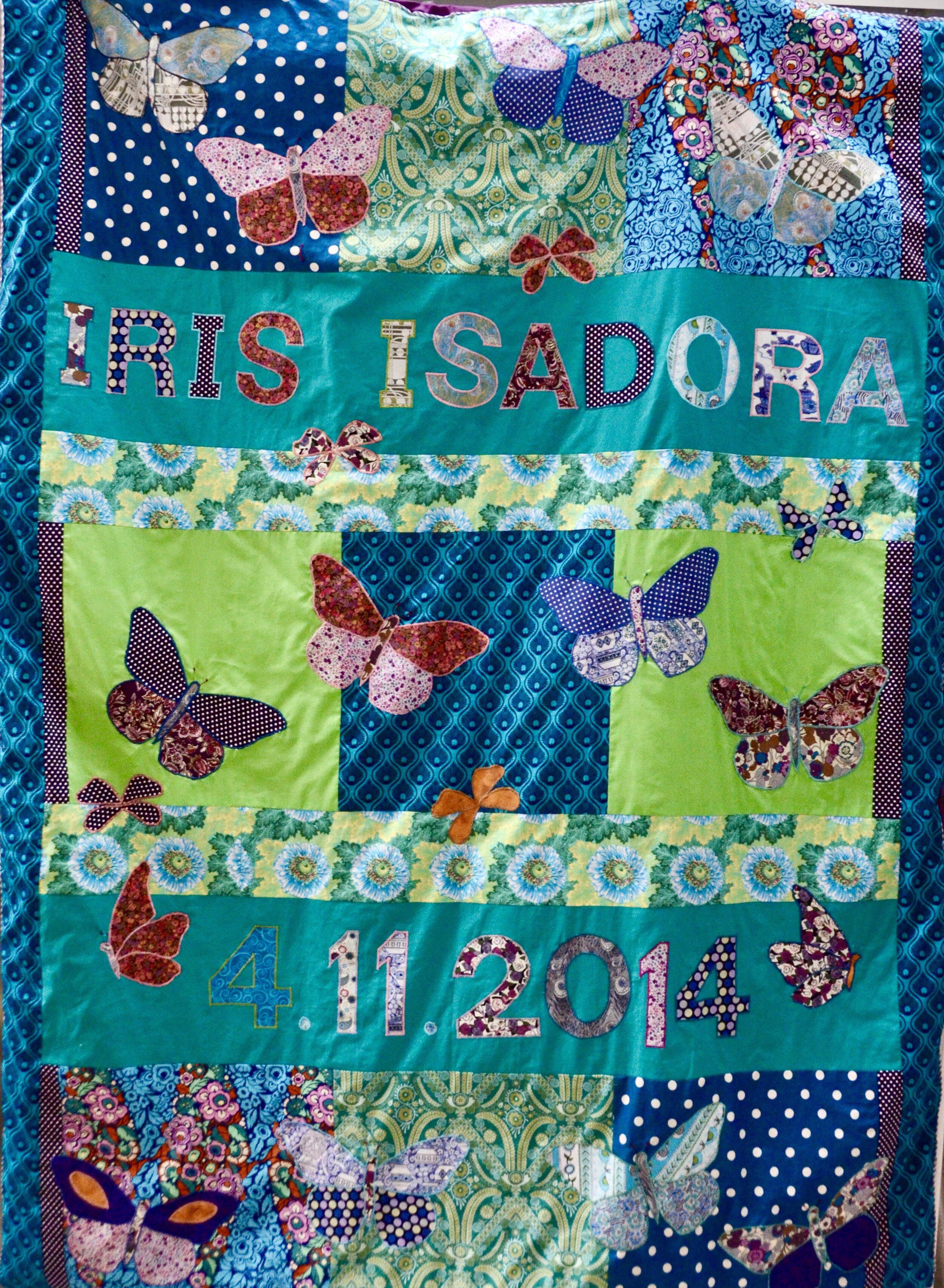 A quilt made for the child of a botanical illustrator.