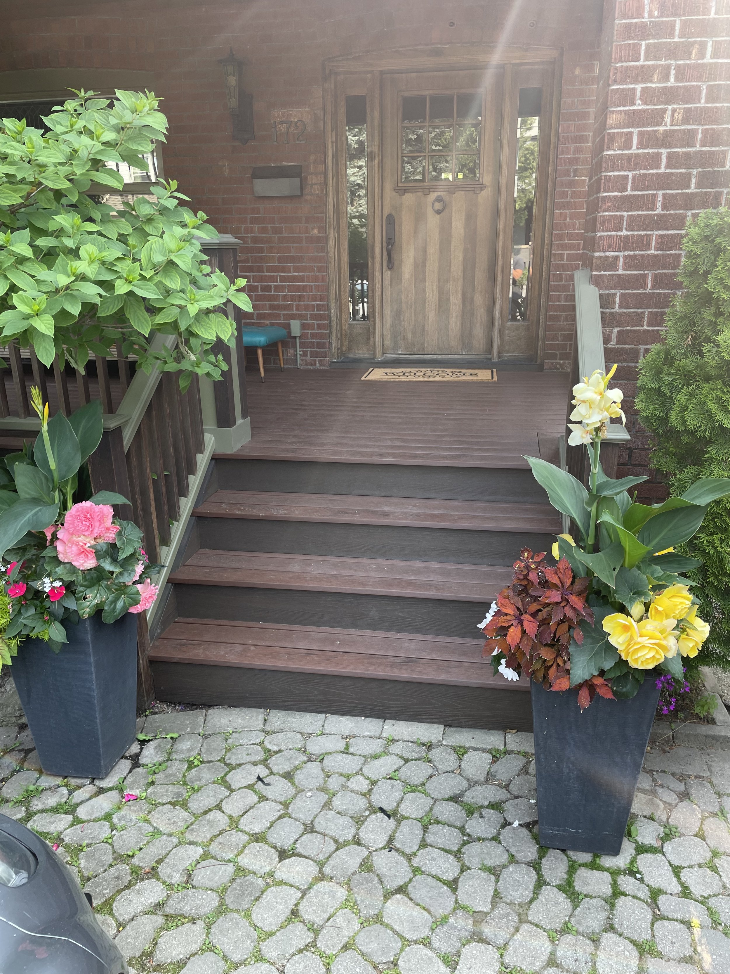 Front deck board replacement with composite decking.