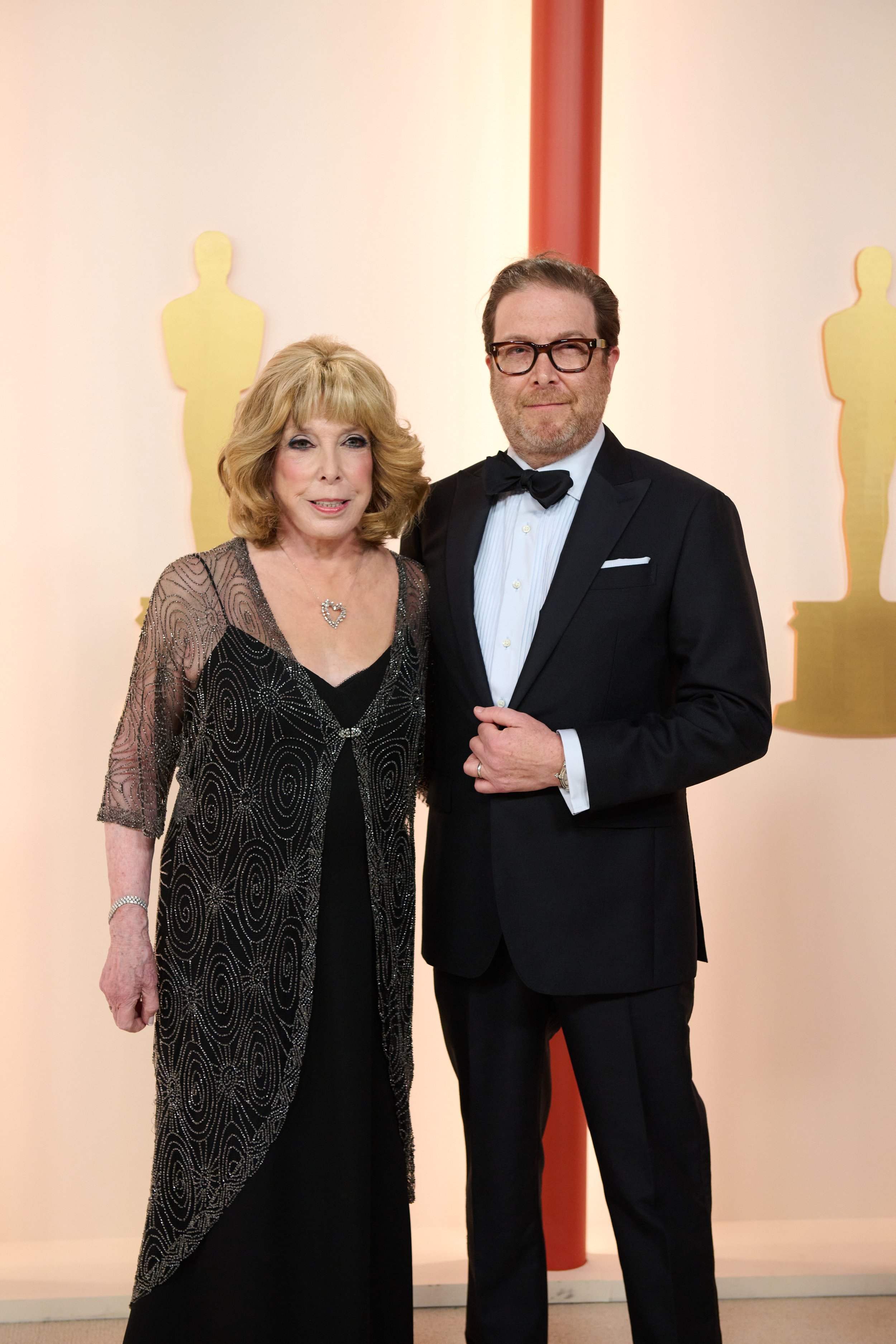 Oscar® nominee Eric Warren Singer and guest arrive on the red carpet of The 95th Oscars