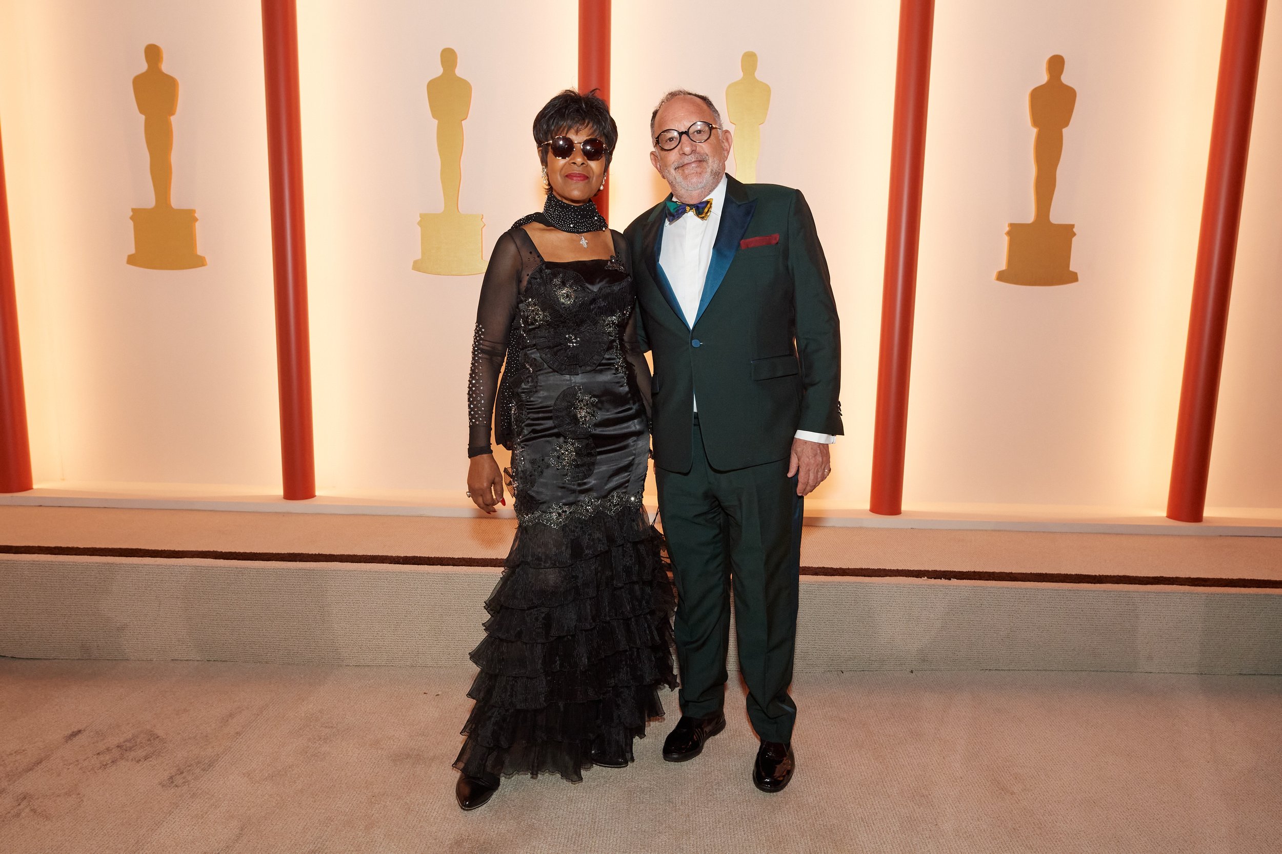 Euzhan Palcy and guest arrives on the red carpet of The 95th Oscars