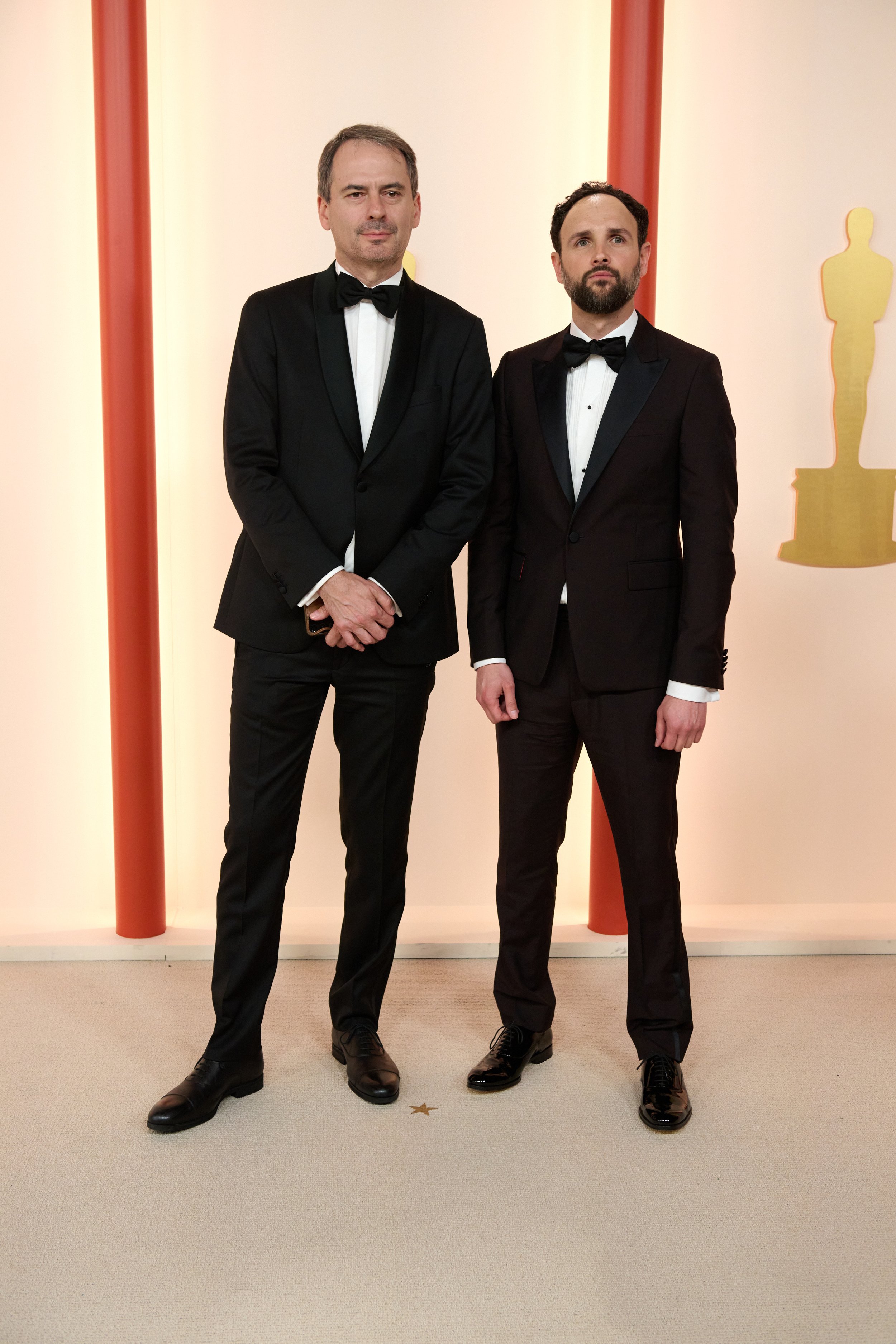 Oscar® nominee Shane Boris (R) and guest arrive on the red carpet of the 95th Oscars