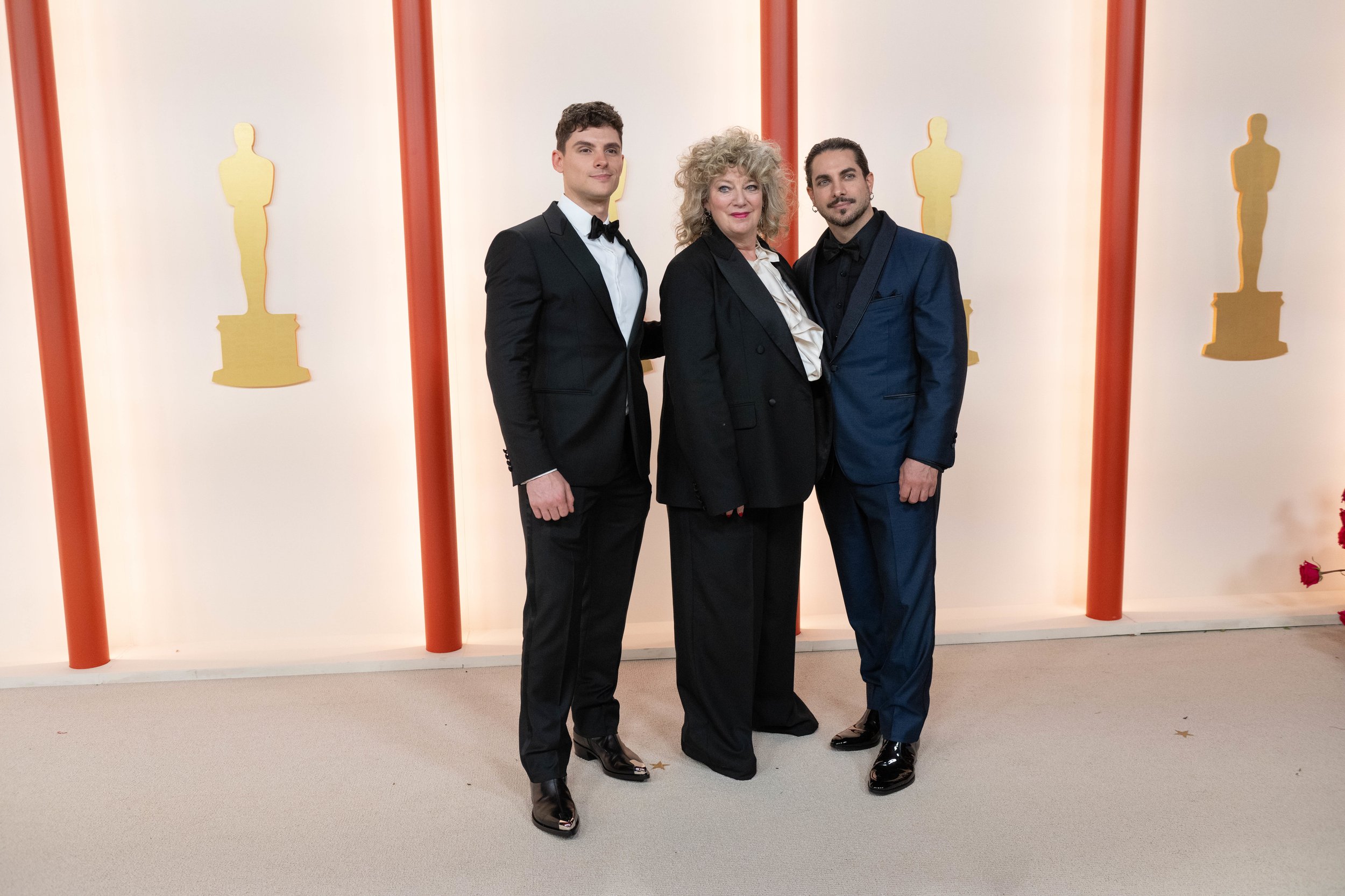 Oscar® nominees Mike Fontaine, Naomi Donne, and Mike Marino arrives on the red carpet of the 95th Oscars