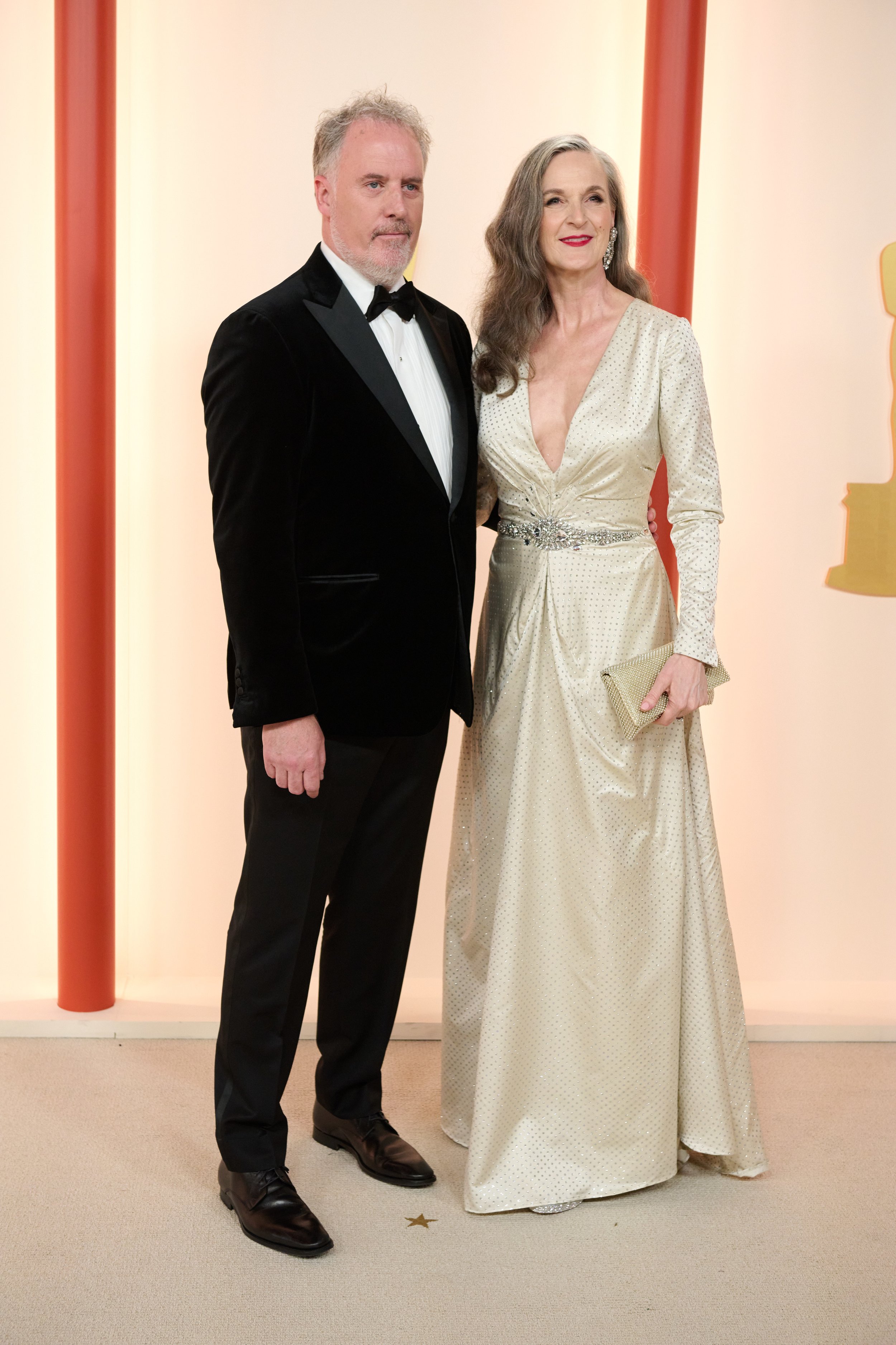  Oscar® nominee Mark Gustafson and Jennifer Smieja arrive on the red carpet of the 95th Oscars