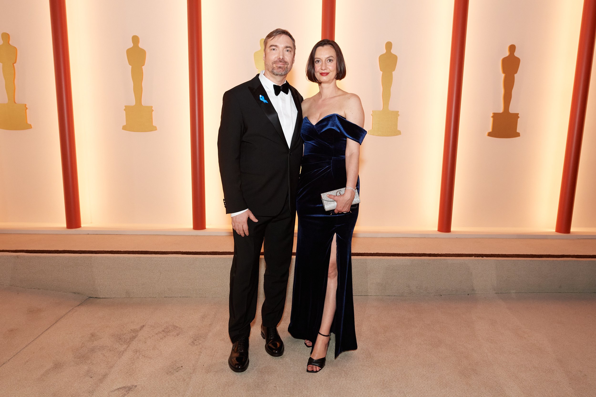 Oscar® nominee Viktor Müller and guest arrive on the red carpet of the 95th Oscars
