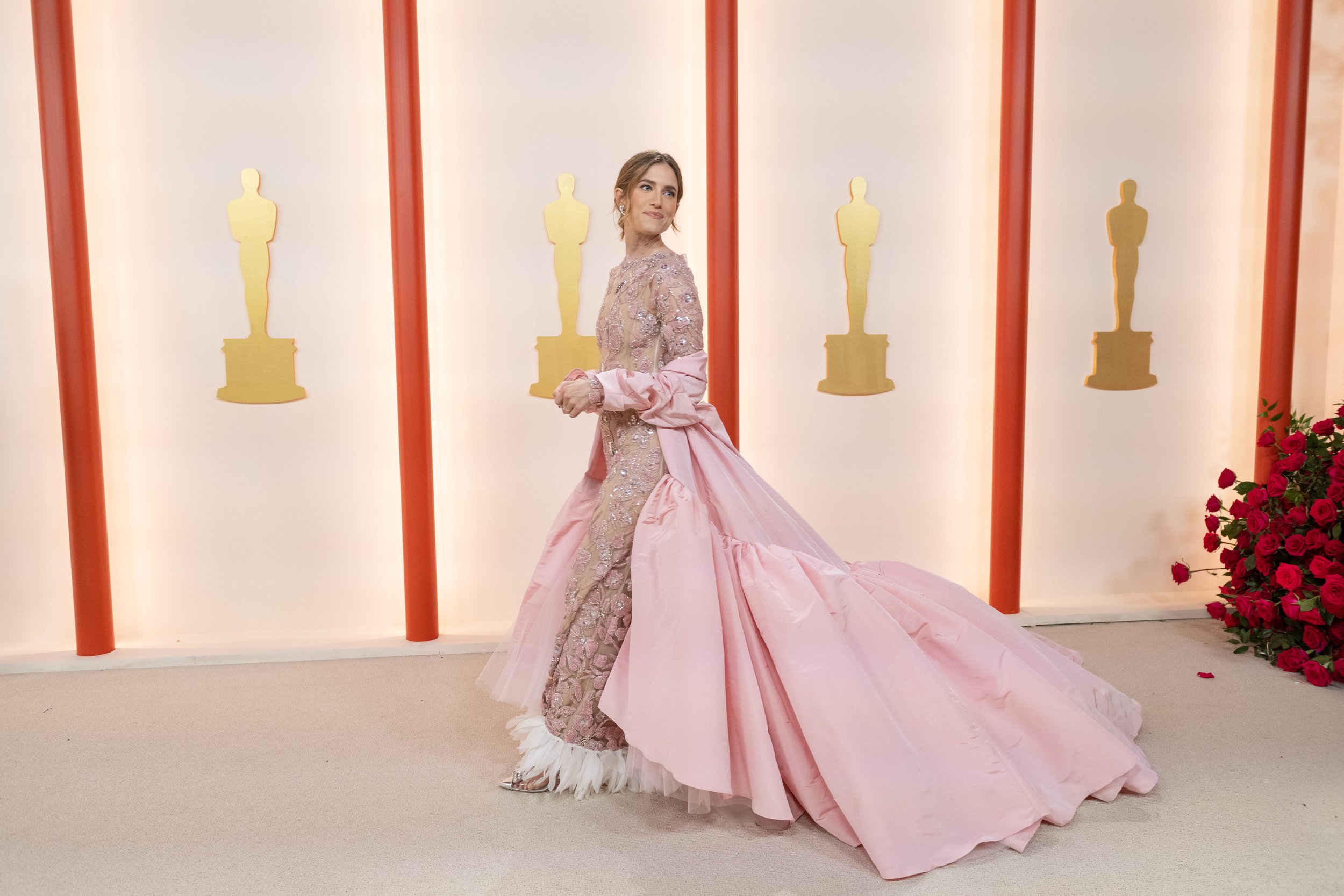 Allison Williams arrives on the red carpet of The 95th Oscars