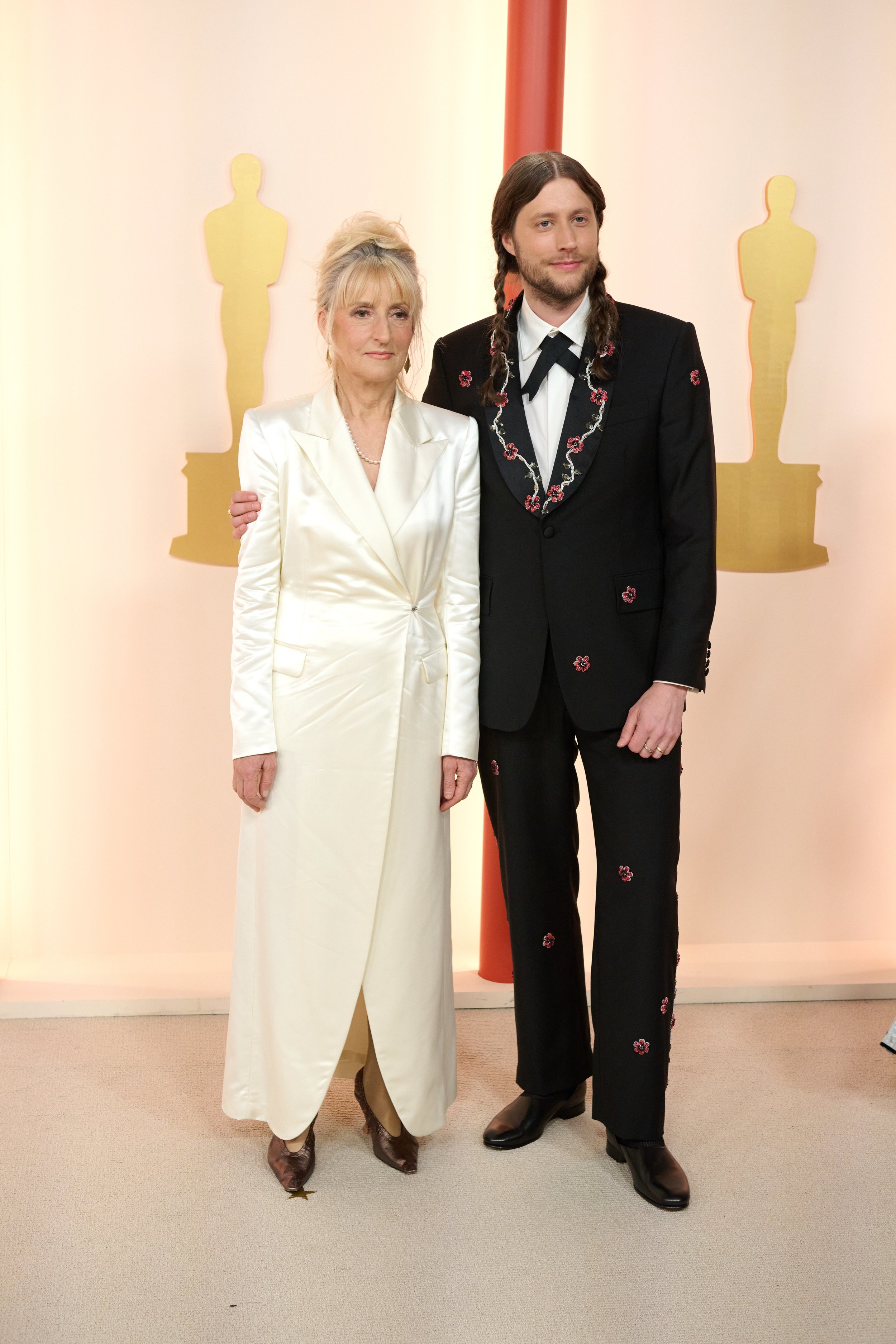 Oscar® nominee Ludwig Göransson arrives with guest on the red carpet of The 95th Oscars