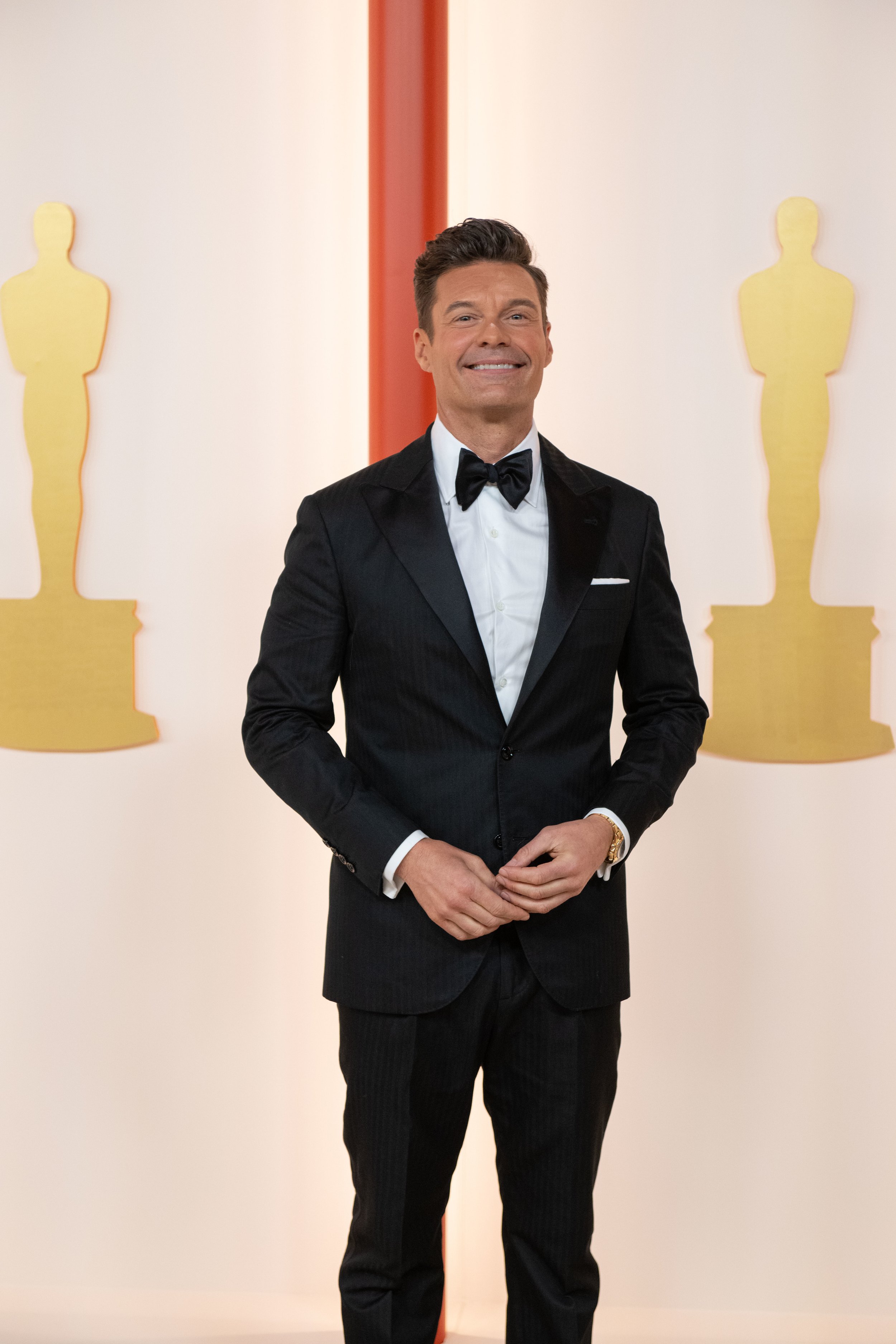 Ryan Seacrest arrives on the red carpet of the 95th Oscars® at the Dolby